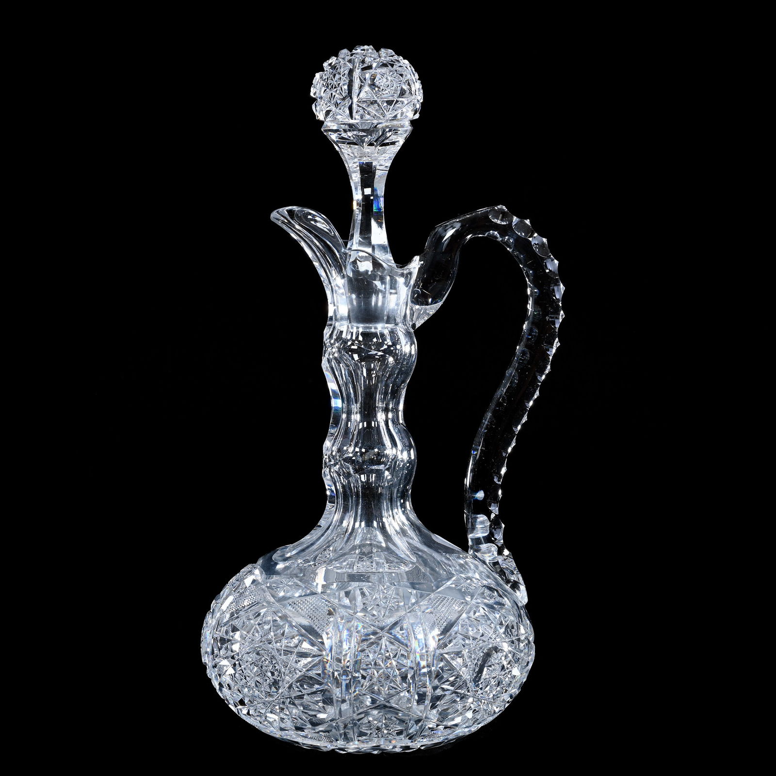 Decanter, Handled, American Brilliant Cut Glass, Hobstar, Crosshatch, Prism And Star Motif: Decanter, Handled, American Brilliant Cut Glass, Hobstar, Crosshatch, Prism And Star Motif, 13.25" x 6.25", Pattern Cut Stopper, Triple Notched Handle, Hobstar Base, Double Gooseneck, Sherri Schott Co