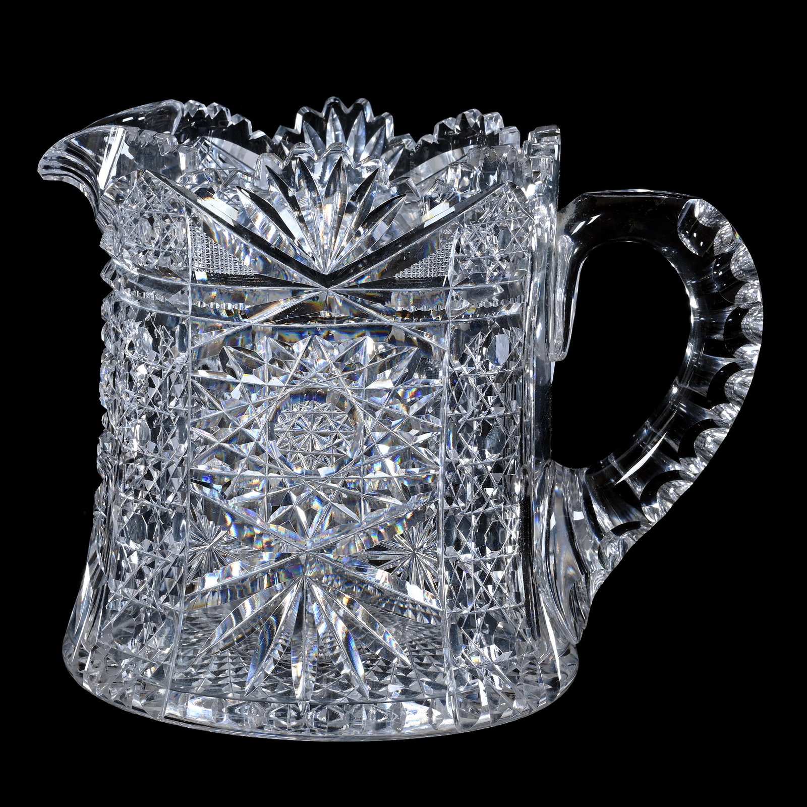 Cider Pitcher, American Brilliant Cut Glass, Hobstar, Cane, Prism, Star, And Fan Motif: Cider Pitcher, American Brilliant Cut Glass, Hobstar, Cane, Prism, Star, And Fan Motif, 6.5" x 8.75", Double Notched Handle, Hobstar Base, Sherri Schott Collection, Kansas.