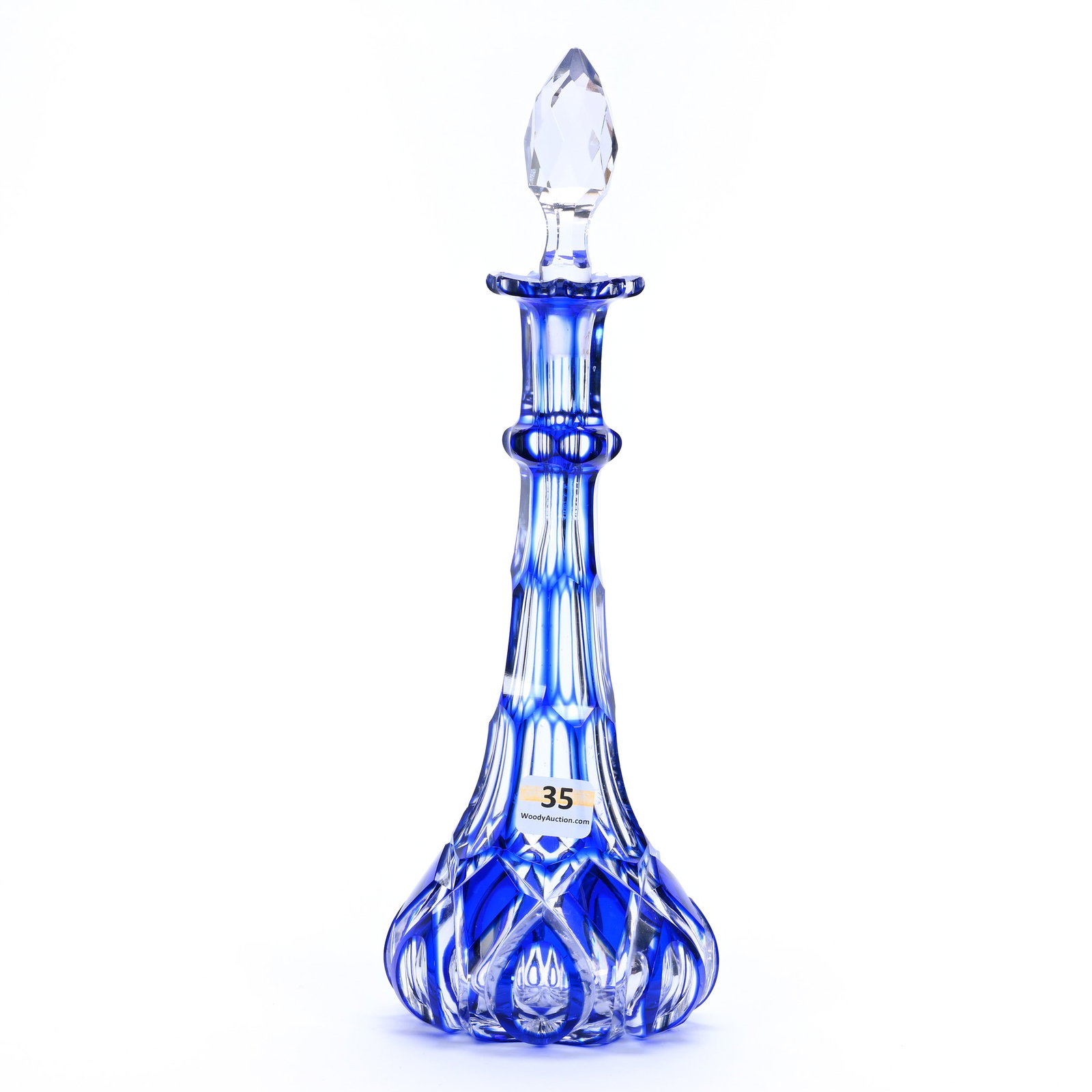 Decanter, Brilliant Period Cut Glass, Cobalt Blue Cut To Clear: Decanter, Brilliant Period Cut Glass, Cobalt Blue Cut To Clear, 11.5" x 4", Diamond, Punty, And Window Motif, Raycut Base, The Faceted Cut Gem Shaped Stopper Is Not Original Fit, Sherri Schott Collect