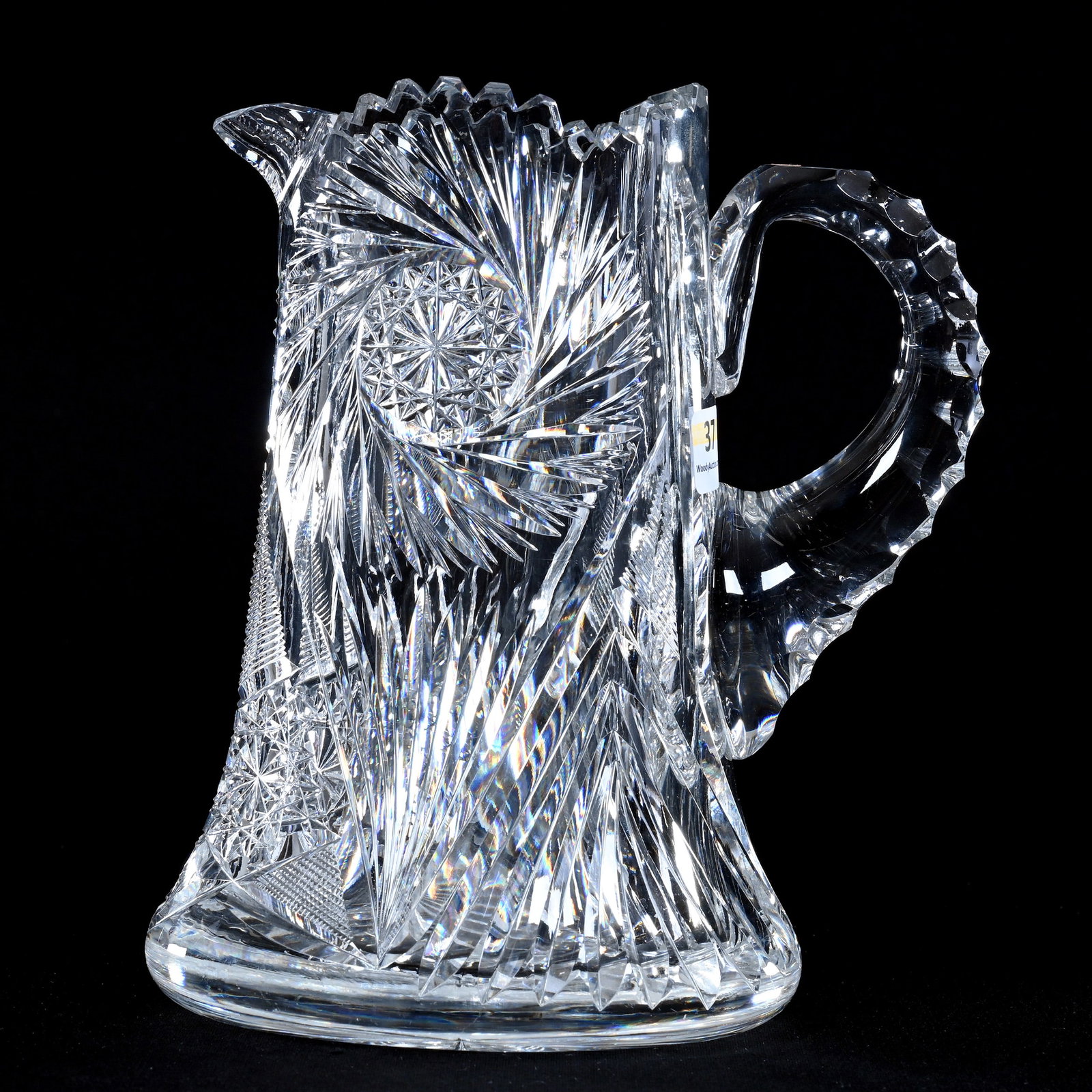 Pitcher, American Brilliant Cut Glass, Signed Hawkes: Pitcher, American Brilliant Cut Glass, Signed Hawkes, 8" x 6.5", Pinwheel, Hobstar, Prism, Crosshatch, And Fan Motif, Triple Notched Handle, Raycut Base, Sherri Schott Collection, Kansas.