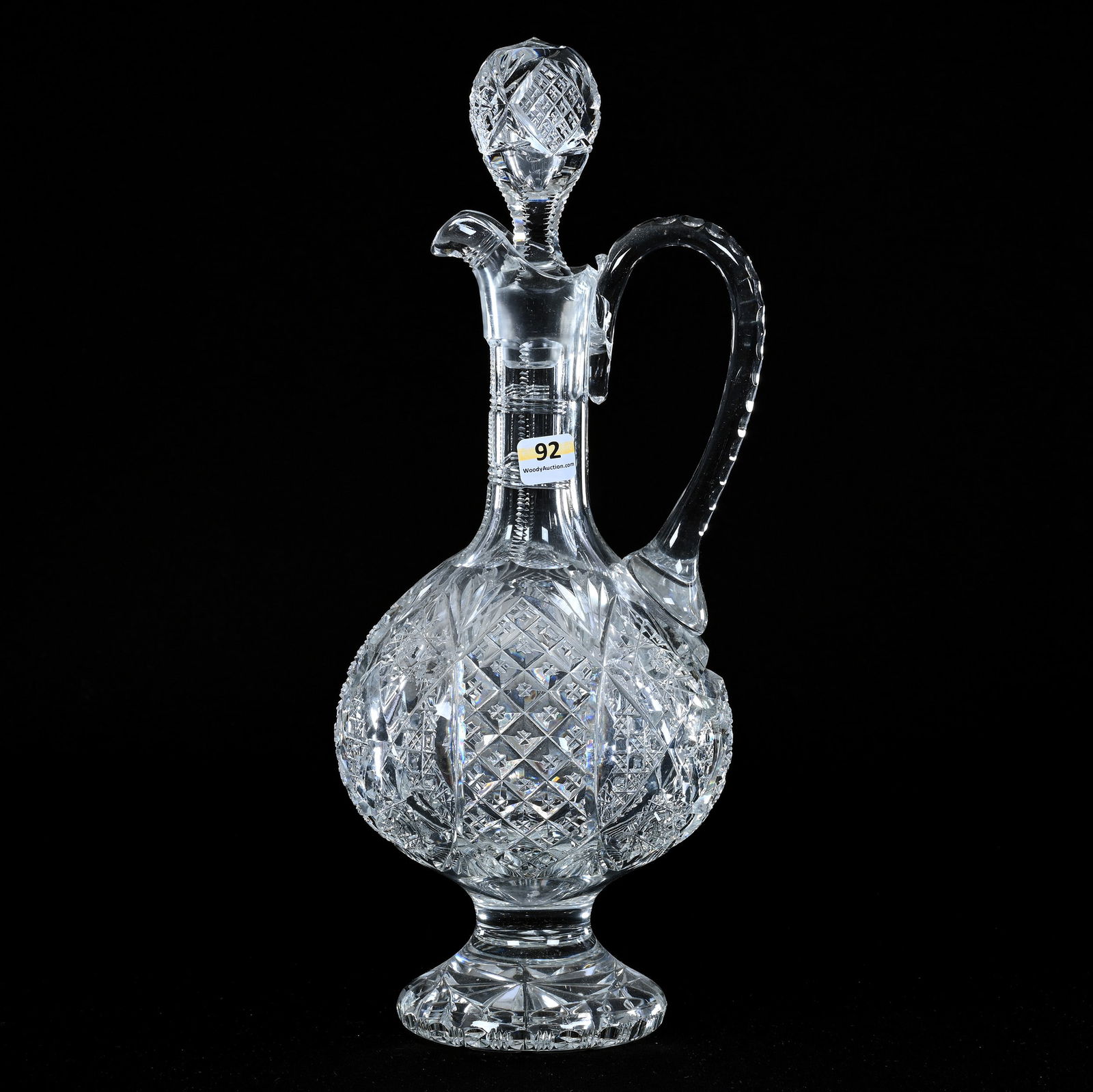 Pedestal Decanter, Brilliant Period Cut Glass: Pedestal Decanter, Brilliant Period Cut Glass, 14.75" x 6", Hobstar, Vesica, Crosscut Diamond, Cane, And Fan Motif, Pattern Cut Stopper, Serious Handle Damage, Georgia Private Collection.