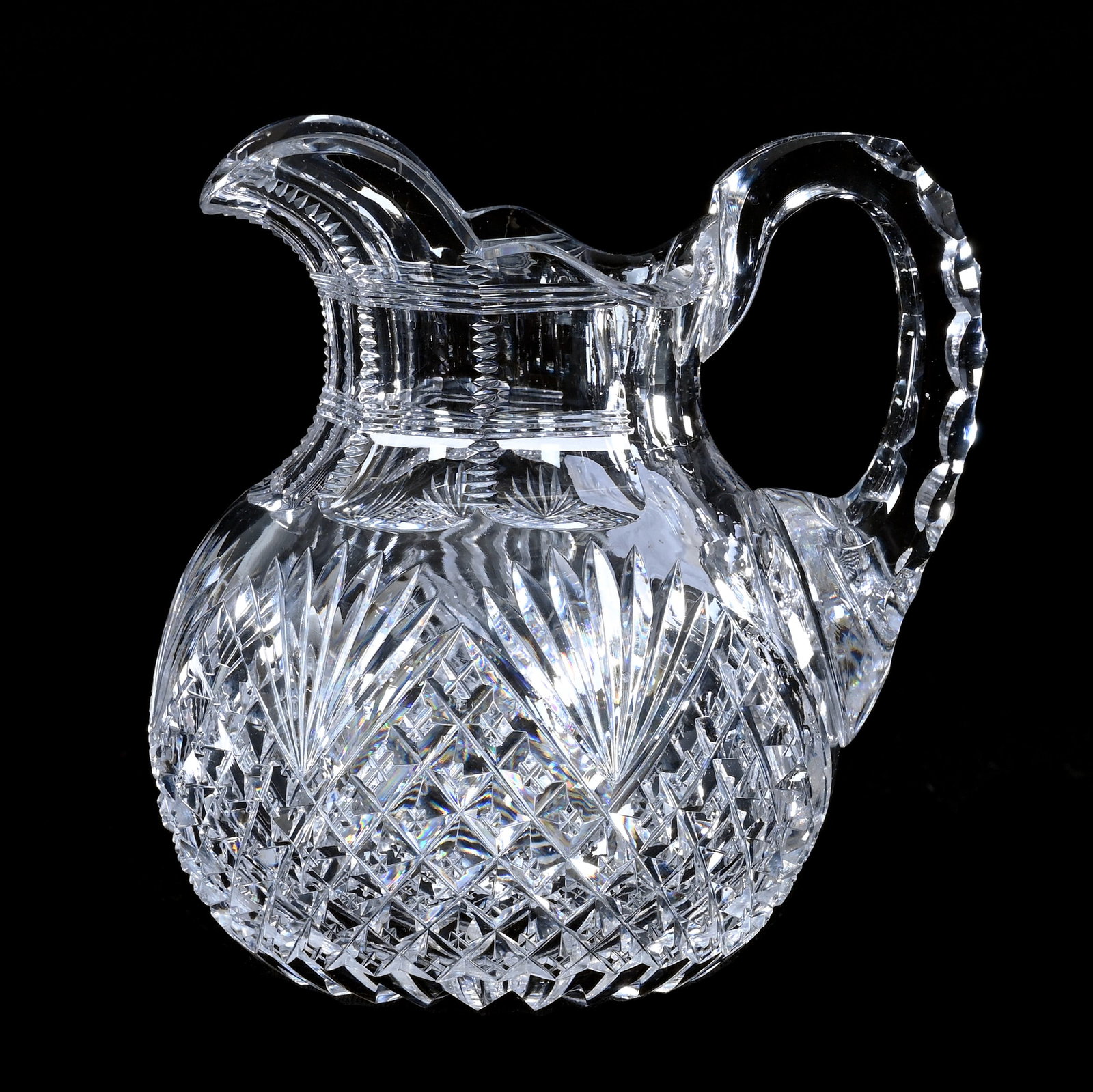 Small Milk Pitcher, American Brilliant Cut Glass, Crosscut Diamond And Fan Motif: Small Milk Pitcher, American Brilliant Cut Glass, Crosscut Diamond And Fan Motif, 4" x 3.75", Ray Cut Base, Triple Notched Handle, Georgia Private Collection.