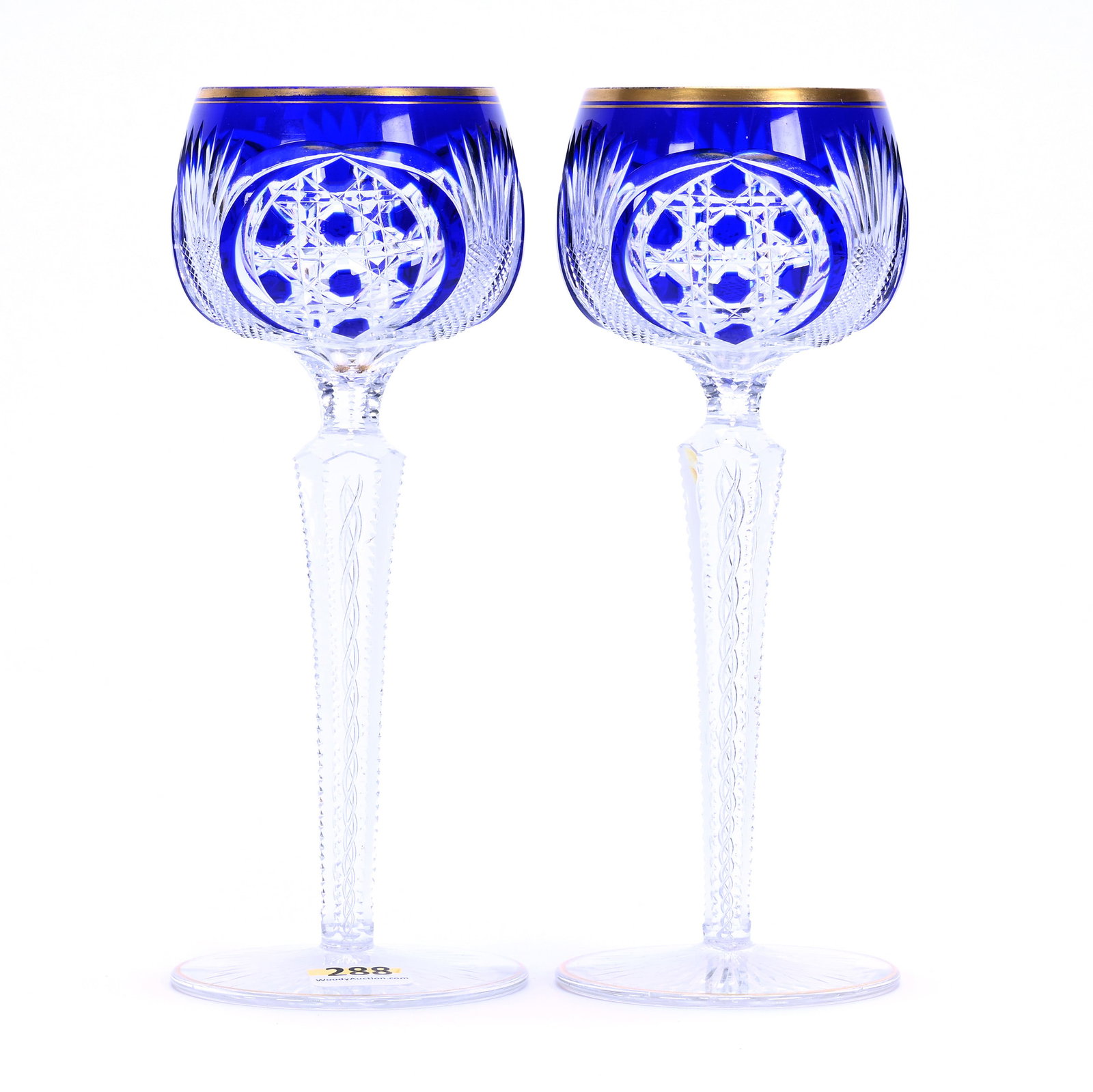 Pair Wine Stems, Brilliant Period Cut Glass, Cobalt Blue Cut To Clear: Pair Wine Stems, Brilliant Period Cut Glass, Cobalt Blue Cut To Clear, 7.75" x 3", Cane Vesica With Crosshatch And Fan Highlights, Air Twist Stem, Ray Cut Foot, Gold Stencil Trim, Sherri Schott Collec