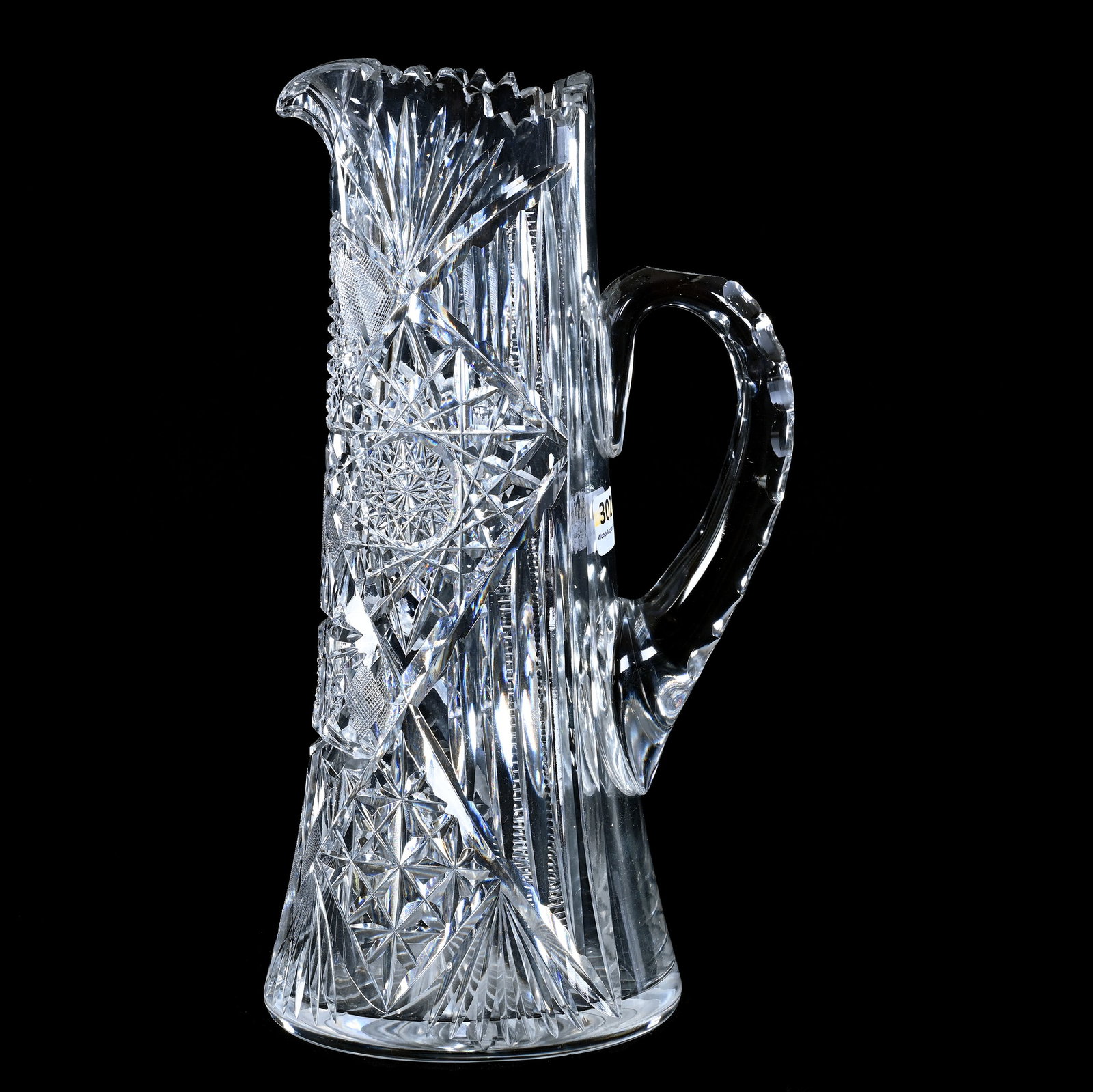 Tankard, American Brilliant Cut Glass, Hobstar, Prism, Cane, Crosshatch & Fan Motif: Tankard, American Brilliant Cut Glass, Hobstar, Prism, Cane, Crosshatch And Fan Motif, 11.25" x 6", Double Notched Handle, Ray Cut Base, Sherri Schott Collection, Kansas.