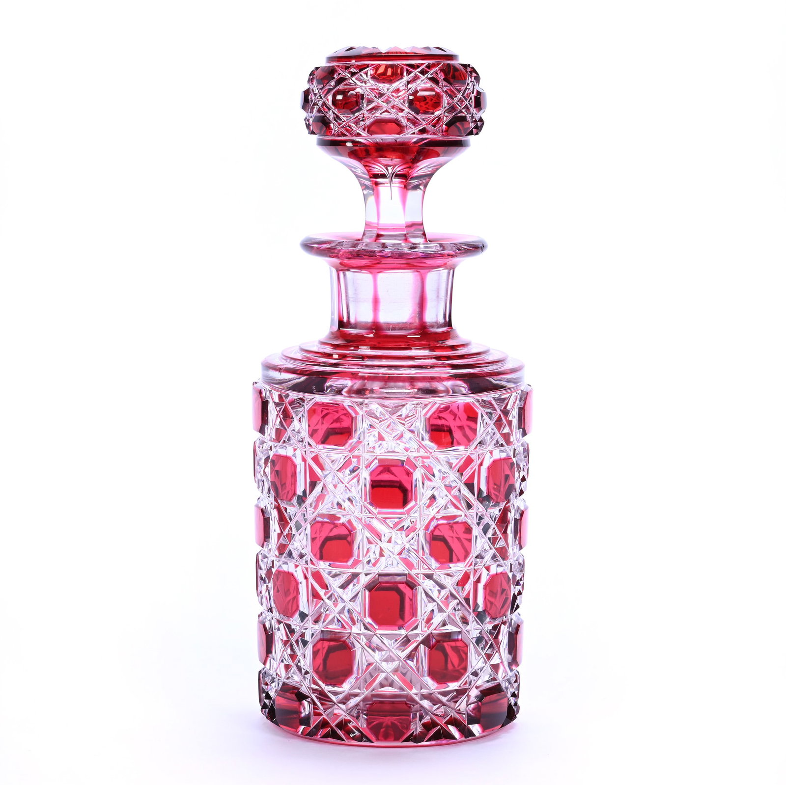 Cologne Bottle, Brilliant Period Cut Glass, Red Cut To Clear: Cologne Bottle, Brilliant Period Cut Glass, Red Cut To Clear, 7.75" x 3.25", Cane Pattern With Pattern Cut Stopper, Ray Cut Base, Two Small Chips On Stopper Plug, Georgia Private Collection.