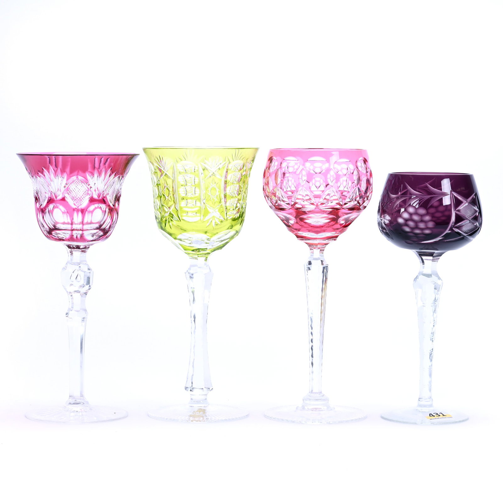 (4) Wine Stems, Cut Glass, Color Cut To Clear: (4) Wine Stems, Cut Glass, Color Cut To Clear, Various Patterns And Shapes, Sizes Range From 7.5" To 8.25", (1) Amethyst, (1) Cranberry, (1) Light Amethyst, (1) Green/Yellow, Georgia Private Collectio