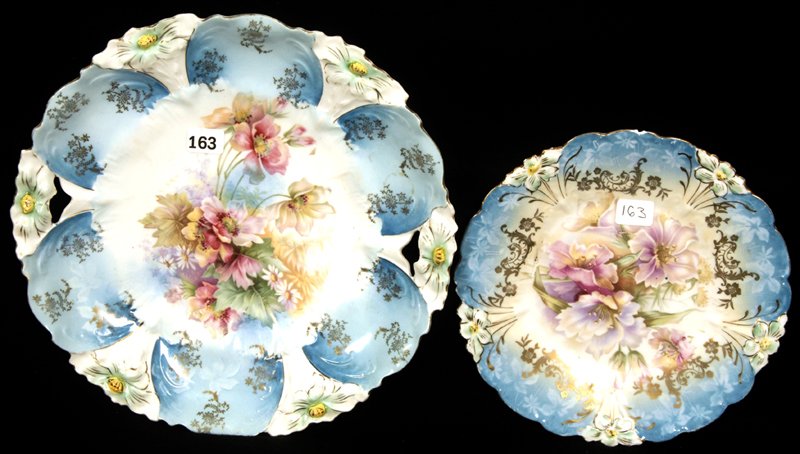 (2) UNMARKED PRUSSIA LILY MOLD PLATES: (2) UNMARKED PRUSSIA LILY MOLD PLATES (1) 10 1/2" TWO HANDLED CAKE PLATE - (1) 8" PLATE (rim chip)