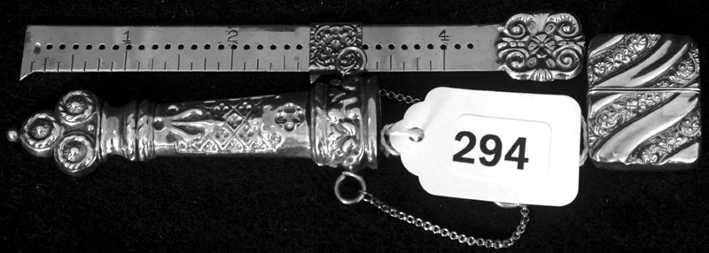 THREE STERLING SILVER VICTORIAN ITEMS: THREE STERLING SILVER VICTORIAN ITEMS INCLUDES - HEM GAUGE BY PELOUZE SCALE CO. - STAMP BOX - SCISSORS CASE FOR CHATELAINE