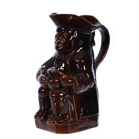 Figural Toby Jug, Rockingham Glazed Pottery, Man Seated With Pitcher