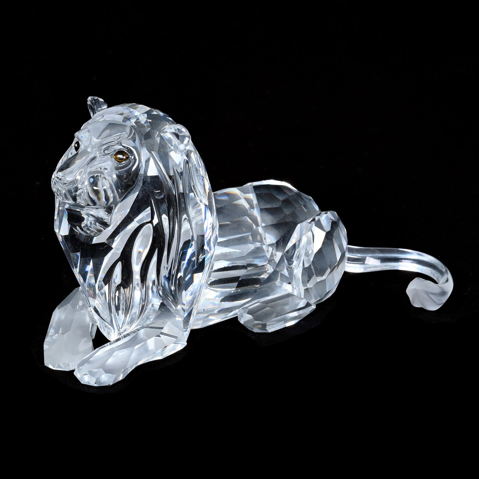 Figurine, Marked Swarovski Crystal, 1985 Annual Edition Inspiration Africa "The Lion": Figurine, Marked Swarovski Crystal, 1985 Annual Edition Inspiration Africa "The Lion", 2.5" x 5" x 2.25", 1.72 Pounds, Sells With Original 7.5" x 6.5" x 7.5" Box, The Bob Lawroski Estate.