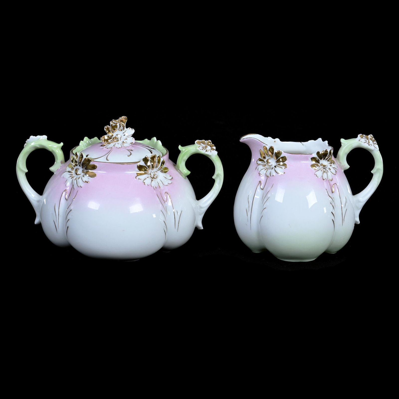 Creamer And Sugar Set, Unmarked R.S. Prussia: Creamer And Sugar Set, Unmarked R.S. Prussia, 4" x 6" x 4.75", 0.74 Pounds, Pink, White And Green Tones, Daisy Mold, Gold Highlights, Creamer With Serious Crack, Rim Chip On Sugar, Illinois Private Co