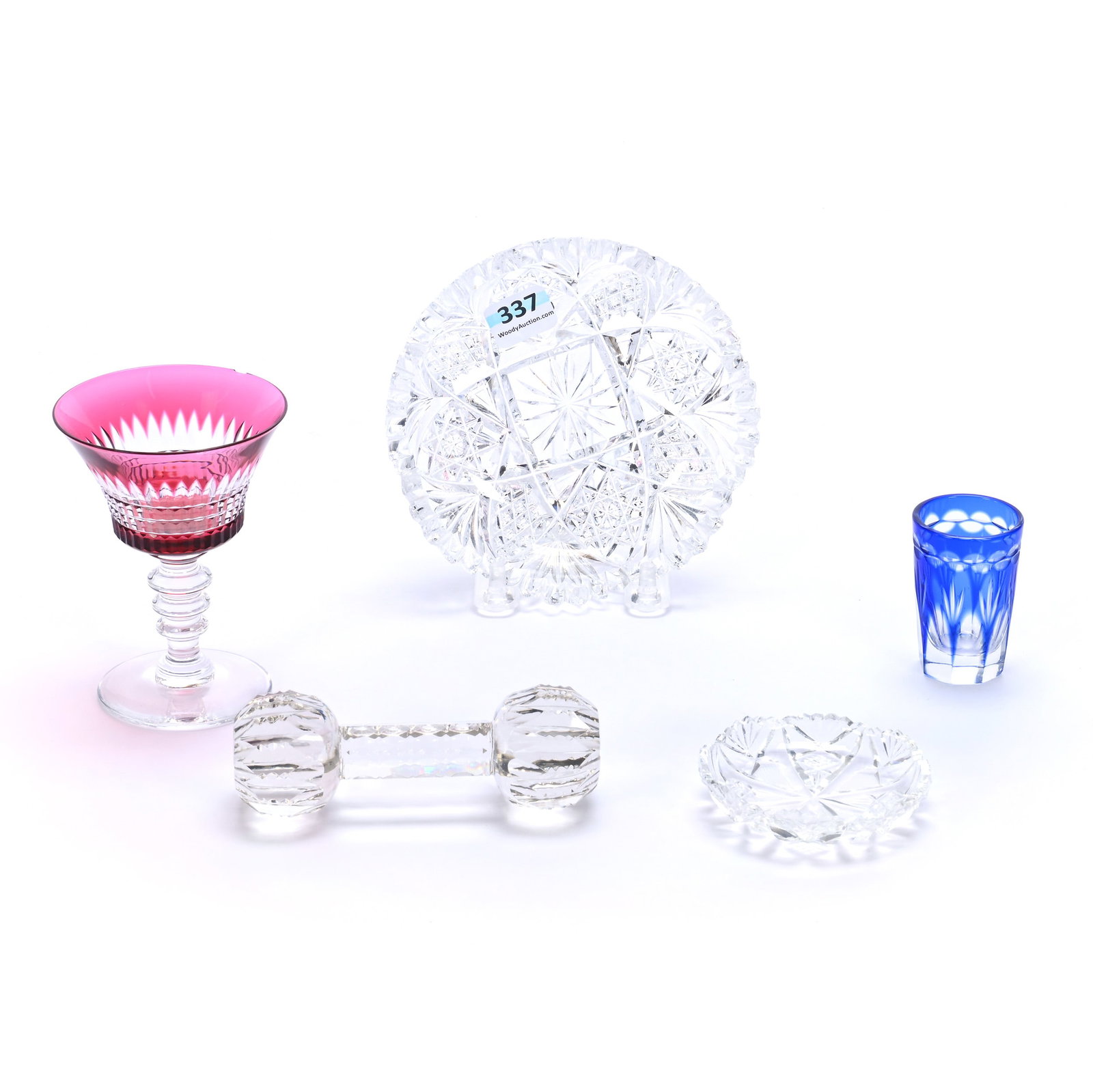 (5) Assorted Items, Brilliant Period Cut Glass: (5) Assorted Items, Brilliant Period Cut Glass, 1.45 Pounds, Includes (1) 4" x 2.875" x 2.875" Wine Stem, Rim Chip, (1) 2.25" x 1.5" x 1.5" Whiskey Glass, Blue Cut To Clear, (1) 1.5" x 4.5" x 1.5" Kni