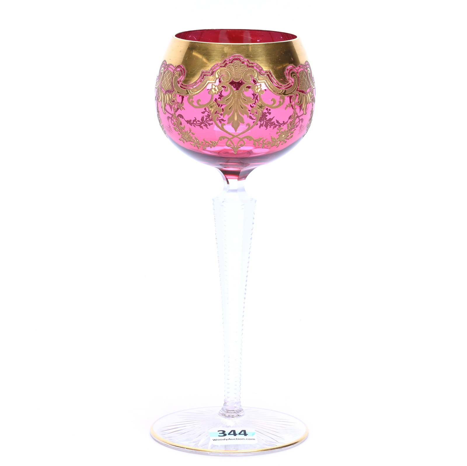 Wine Stem, Cranberry Overlay: Wine Stem, Cranberry Overlay, 7.75" x 3" x 3", 0.40 Pounds, Clear Notched Stem, Ray Cut Foot, Etched Garland & Scroll Design With Gold Overlay, Bill And Kathleen Pratt Collection, Kansas.