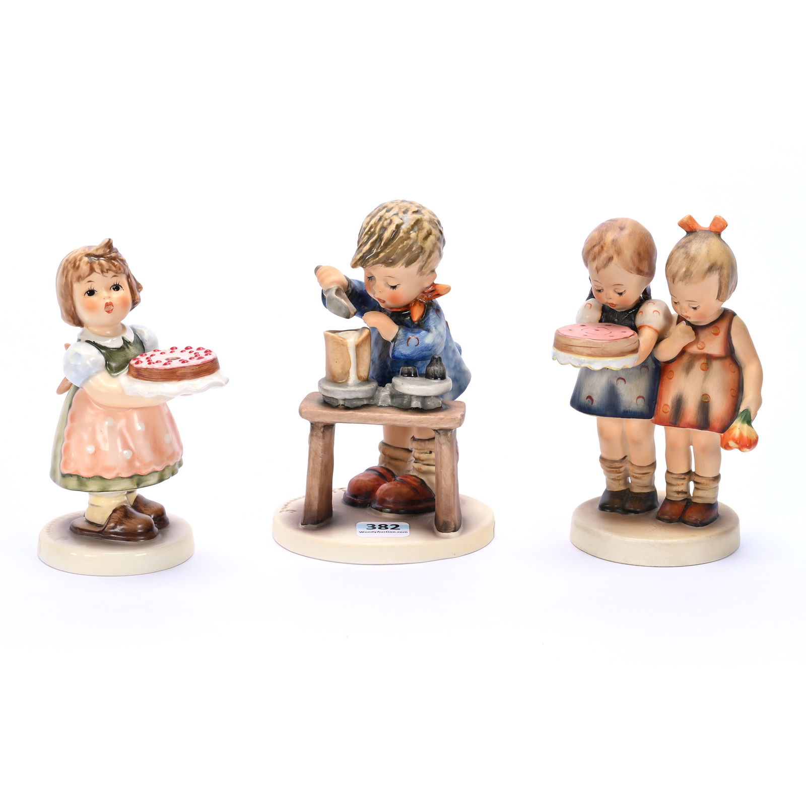 (3) Hummel Figurines: (3) Hummel Figurines, 1.54 Pounds, (1) 5.75" x 3.75" x 3.5", A Fair Measure #345, TM-5, (1) 5.75" x 3" x 3", Happy Birthday #176/0, TM-2, (1) 5.25" x 3.25" x 2.5", Birthday Candle #440, TM-6, Exclusiv