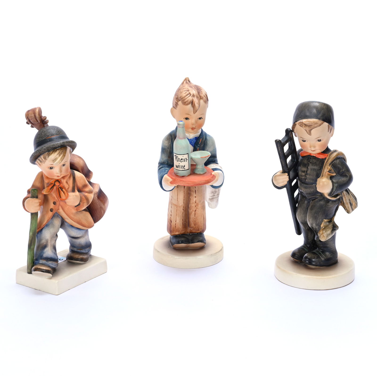 (3) Hummel Figurines: (3) Hummel Figurines, 1.30 Pounds, (1) 6.5" x 2.75" x 3", Chimney Sweep #12/1, TM-2, (1) 6.25" x 3.5" x 2", Little Cellist #89/1, TM-2, (1) 6.75" x 3.5" x 2.5", Waiter #154/1, TM-6, Bill And Kathleen