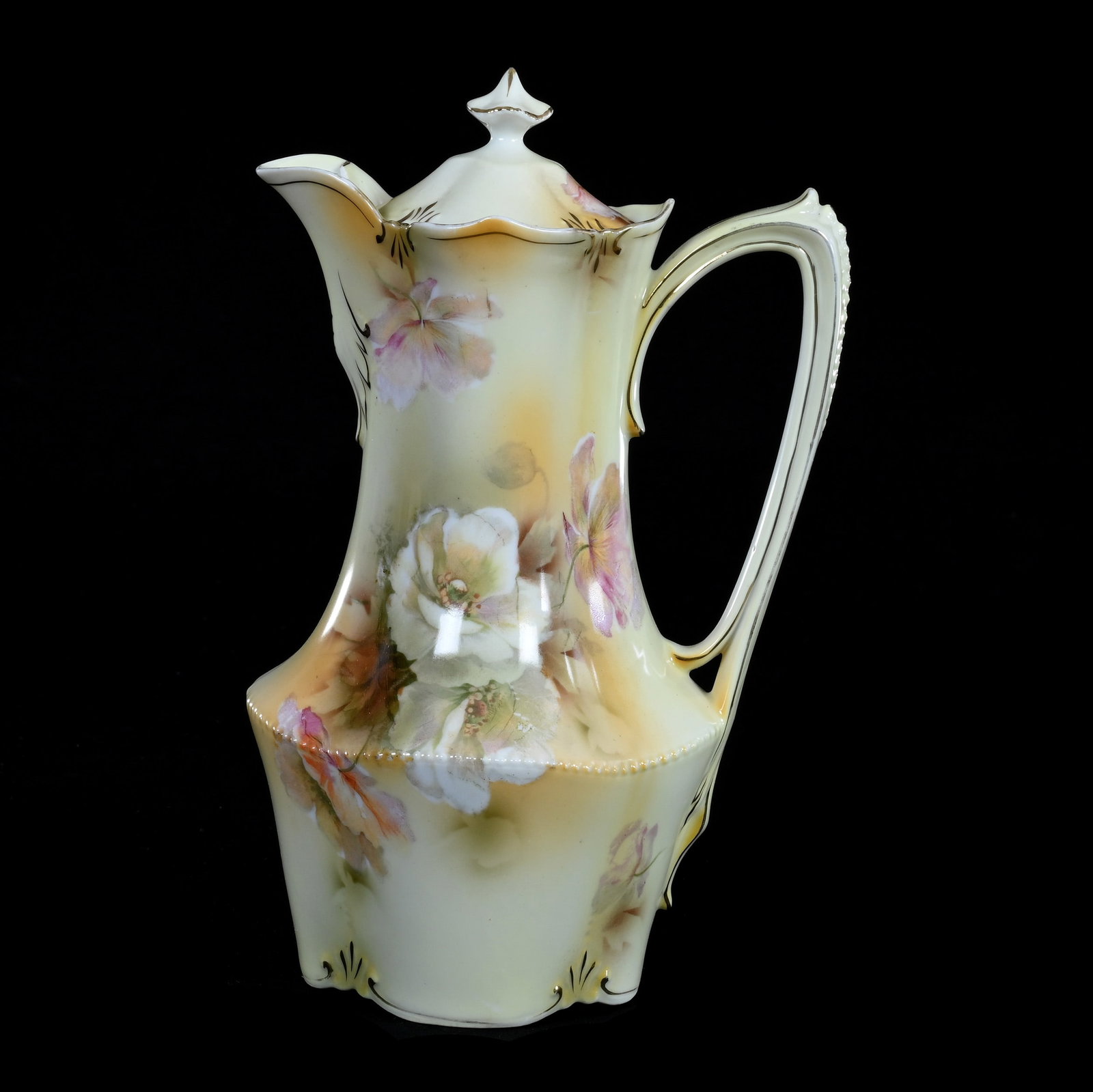 Chocolate Pot Marked R.S. Prussia: Chocolate Pot Marked R.S. Prussia, 9.75" x 6.25" x 5", 1.14 Pounds, Yellow And Brown Tones, White Poppy Decor, Sizable Chip And Hairline In Spout, Hairline On Handle Near Upper Attachment Point. This 