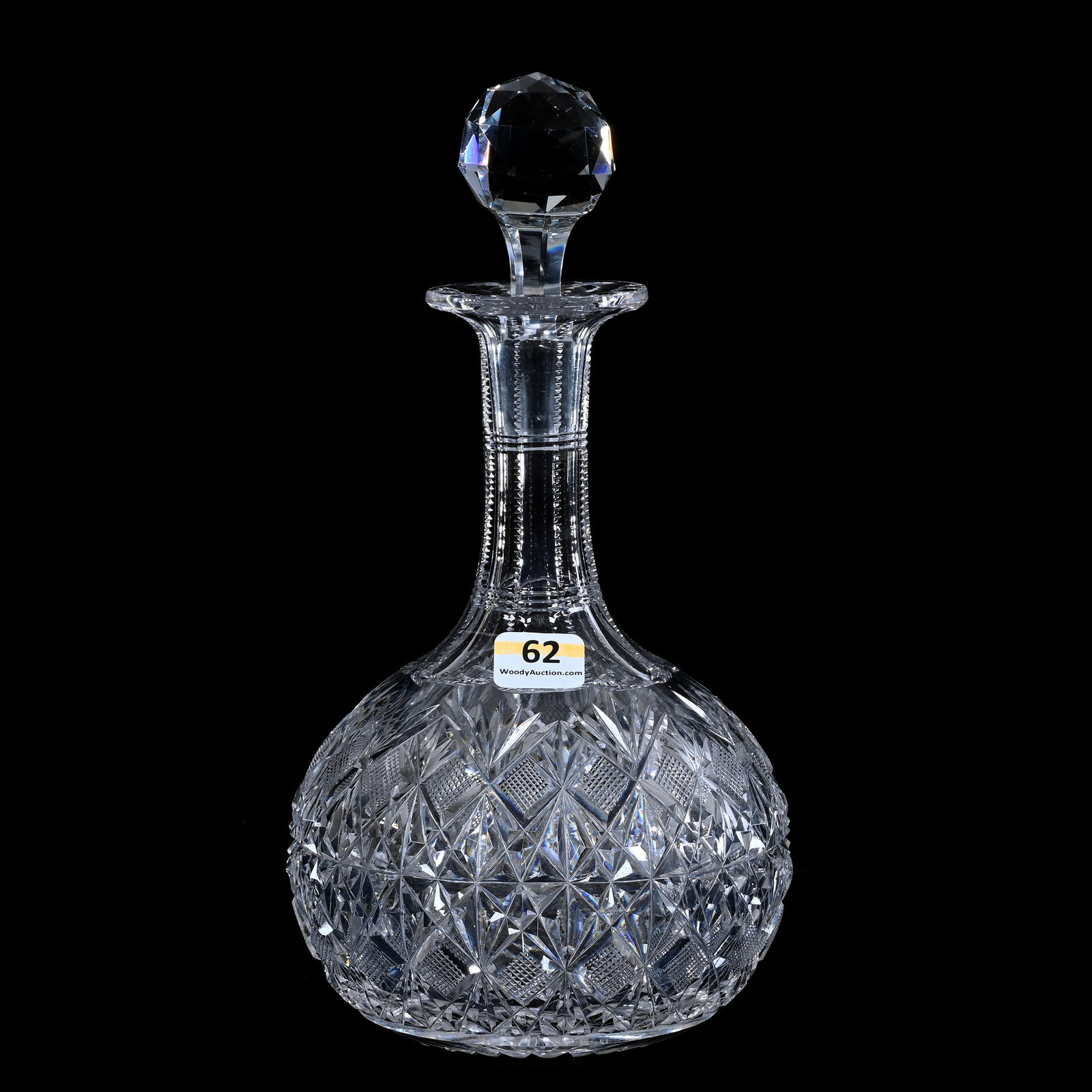Decanter, American Brilliant Cut Glass, Diamond Geometric And Fan Motif: Decanter, American Brilliant Cut Glass, Diamond Geometric And Fan Motif, 9.5 x 5 x 5 Inches, Ray Cut Base, Pattern Chips, Rim Bruise, 3 Pounds, Kansas Private Collection.