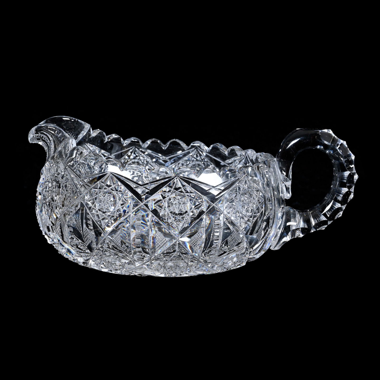 Plantation Size Creamer, American Brilliant Cut Glass: Plantation Size Creamer (Or Master Sauce), American Brilliant Cut Glass, 3 x 6.75 x 5 Inches, Attributed to Pairpoint, Hobstar, Prism, And Crosscutting Motif, Triple Notched Handle, Annealing Crack, 2