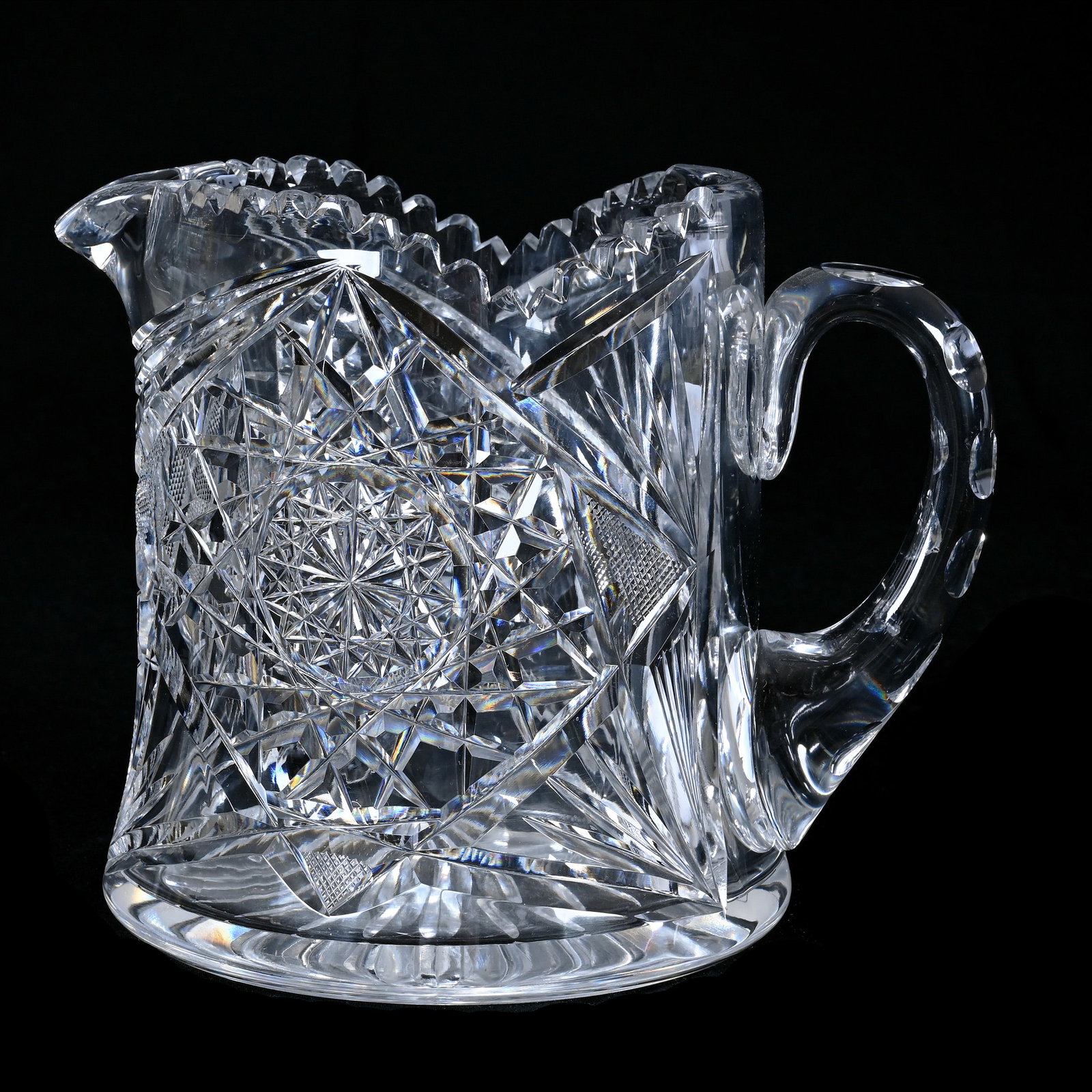 Cider Pitcher, American Brilliant Cut Glass, Hobstar, Crosscutting & Fan Motif: Cider Pitcher, American Brilliant Cut Glass, Hobstar, Crosscutting & Fan Motif, 7 x 8.5 x 6 Inches, Double Notched Handle, Ray Cut Base, 7 Pounds, Colorado Private Collection.
