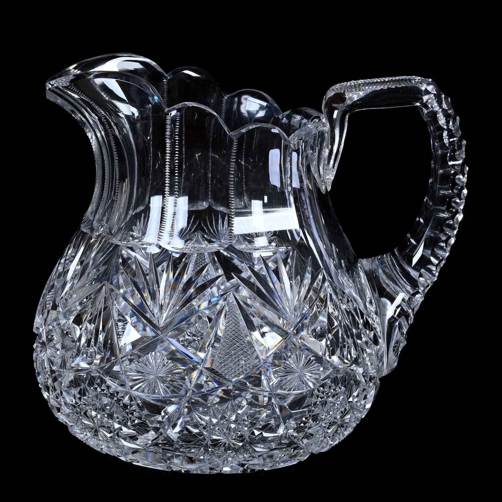 Jug Pitcher, American Brilliant Cut Glass, Hobstar, Crosscutting, Star And Fan Motif: Jug Pitcher, American Brilliant Cut Glass, Hobstar, Crosscutting, Star And Fan Motif, 7.25 x 7.75 x 6.25 Inches, Triple Notched Handle, Hobstar Base, Nice Example, 4 Pounds, Colorado Private Collectio