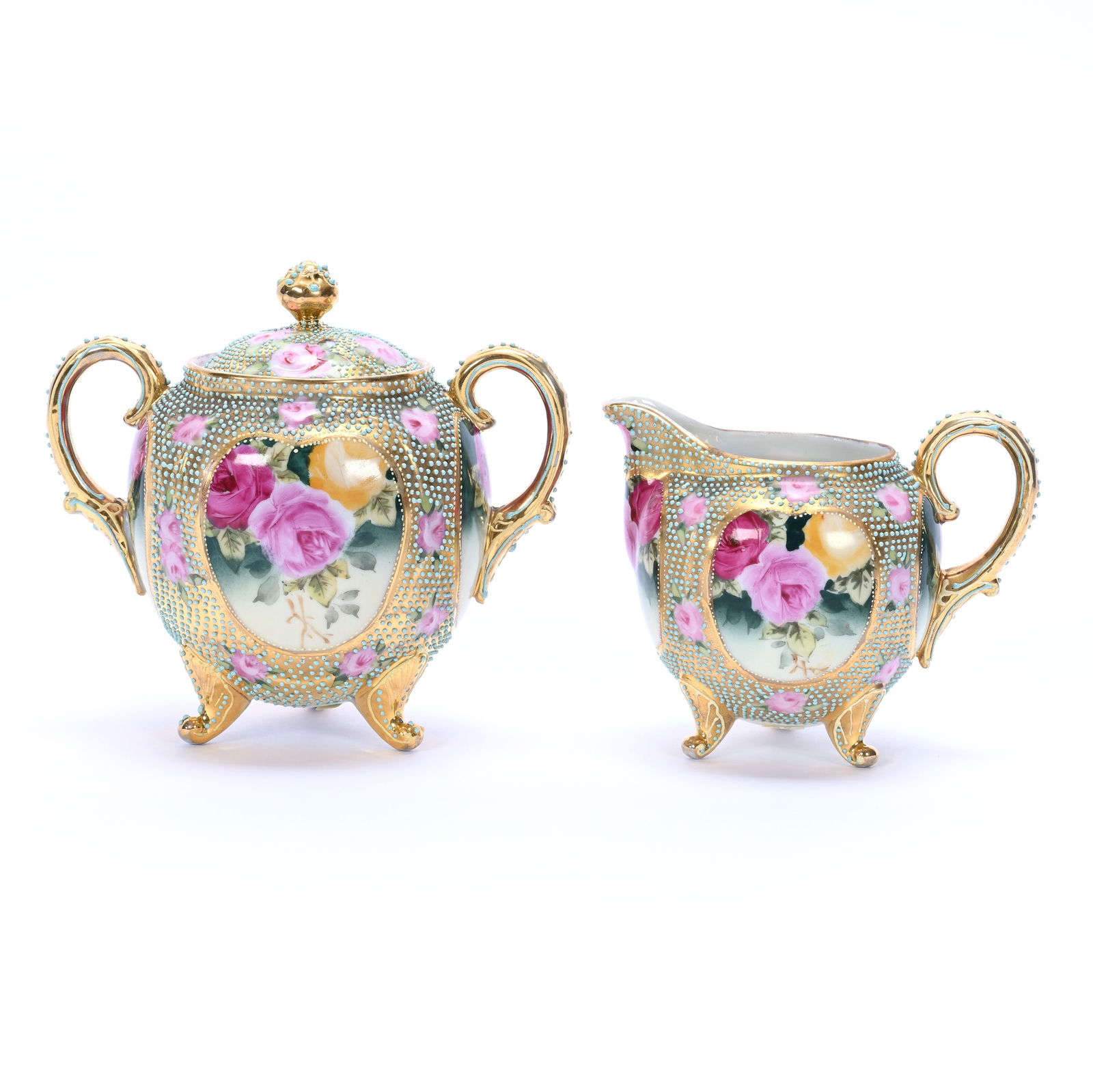 Footed Creamer & Sugar Marked Royal Moriye Nippon: Footed Creamer & Sugar Marked Royal Moriye Nippon, 5.75 x 6.25 x 4.25 Inches, Green And Yellow Tones With Colorful Rose Decor, Extensive Blue Beaded Enamel Tapestry Highlights, Some Applied Enamel