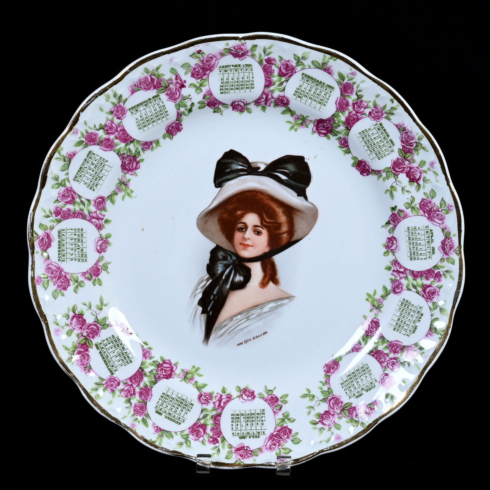 1910 Calendar Plate Marked "Carnation McNicol", Gibson Girl Portrait: 1910 Calendar Plate Marked "Carnation McNicol", Gibson Girl Portrait, 0.75 x 8.25 x 8.25 Inches, 0.7 Pounds, Dr. Harold & Audrey Eklund Estate, Iowa.