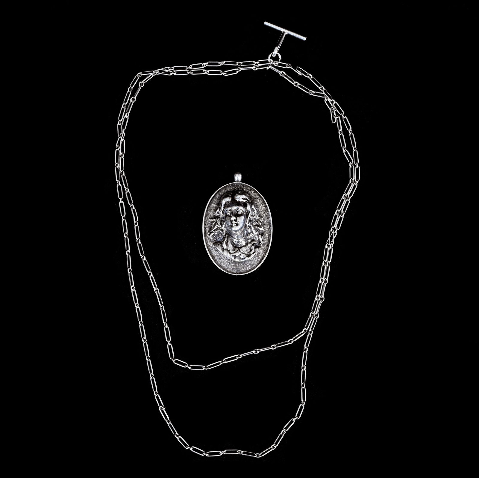 Solid Sterling Silver Embossed Broach, Woman's Head, No Maker' S Mark Visible: Solid Sterling Silver Embossed Broach, Woman's Head, No Maker's Mark Visible, 0.75 x 2.5 x 1.625 Inches, Sells With 48" Sterling Link Chain With Adapter, 47.0 Grams, Dr. Harold & Audrey Eklund