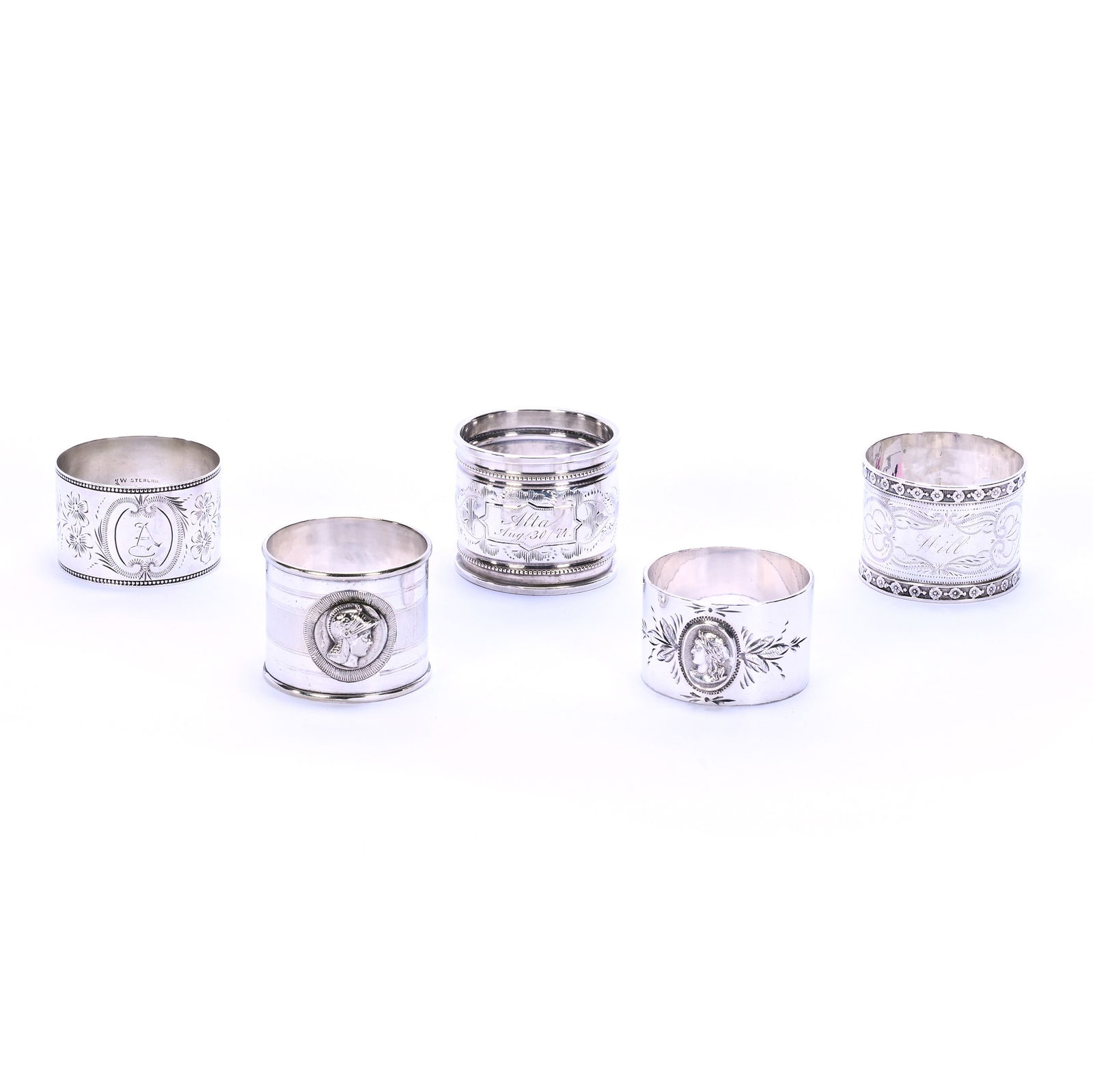 (5) Sterling & Coin Silver Napkin Rings, Various Designs: (5) Sterling & Coin Silver Napkin Rings, Various Designs, 1.25 x 1.5 x 1.5 Inches, See Photos For Details, 114.0 Grams, Dr. Harold & Audrey Eklund Estate, Iowa.