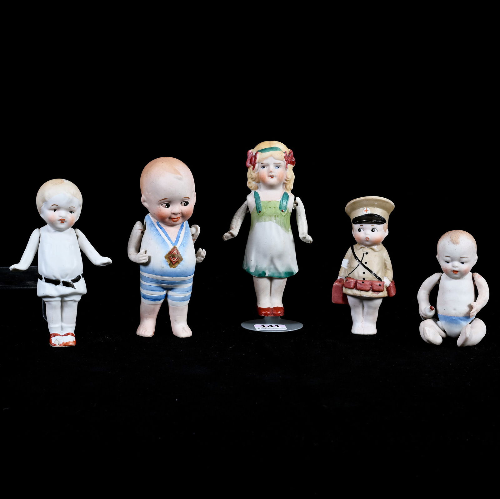 (5) Japanese All Bisque Dolls Marked Nippon: (5) Japanese All Bisque Dolls Marked Nippon, 5" Approximately x 2 x 1.5 Inches, Doll With Black Belt Has Surface Chip On Foot, See Photos For Details, 0.7 Pounds, Dr. Harold & Audrey Eklund Estate, Io