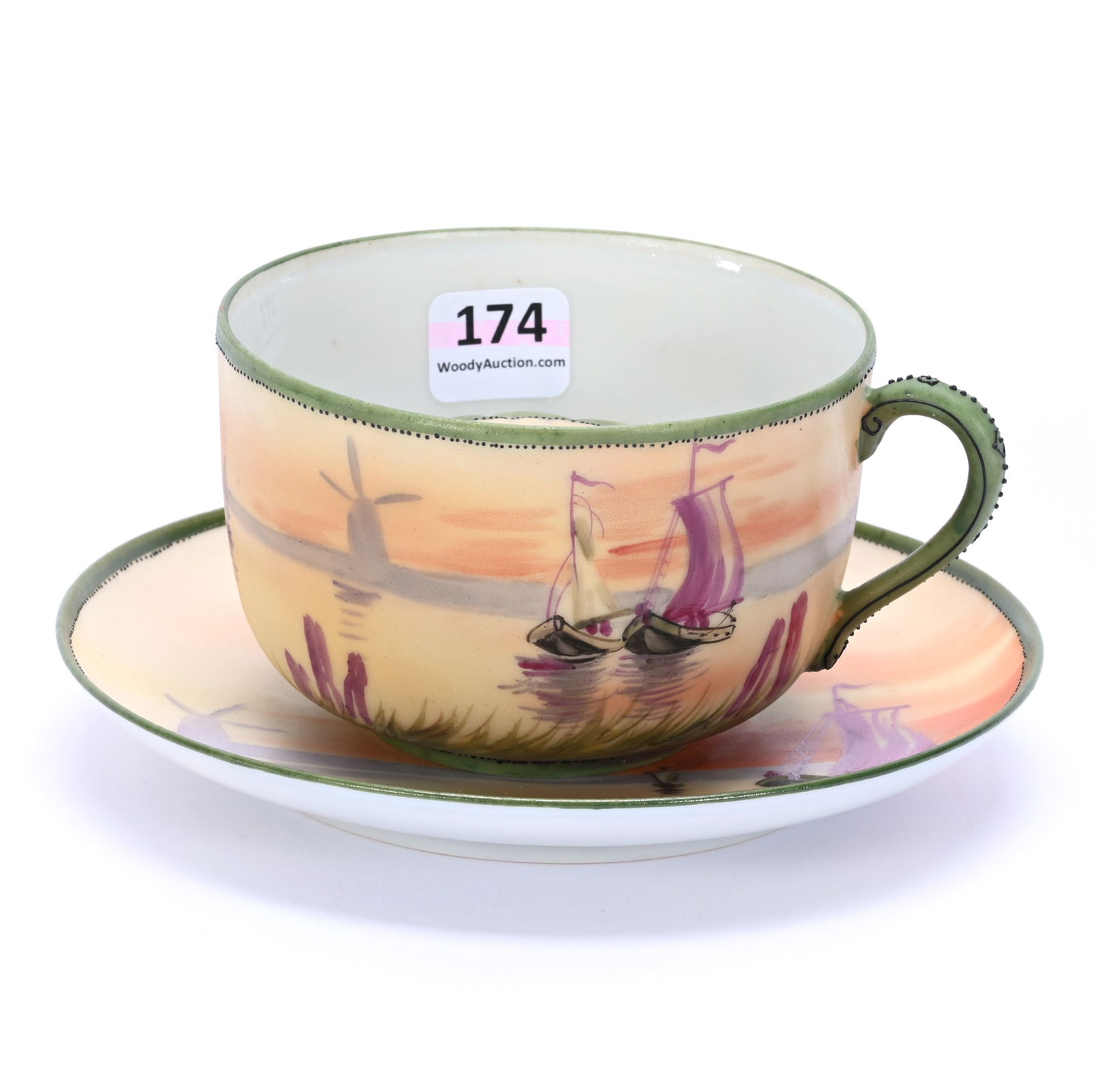 Mustache Cup & Saucer Marked Nippon: Mustache Cup & Saucer Marked Nippon, 2.75 x 5.75 x 5.75 Inches, Sunset Lake And Sailboat Scenic Decor, Base Nick On Cup, 0.6 Pounds, Dr. Harold & Audrey Eklund Estate, Iowa.