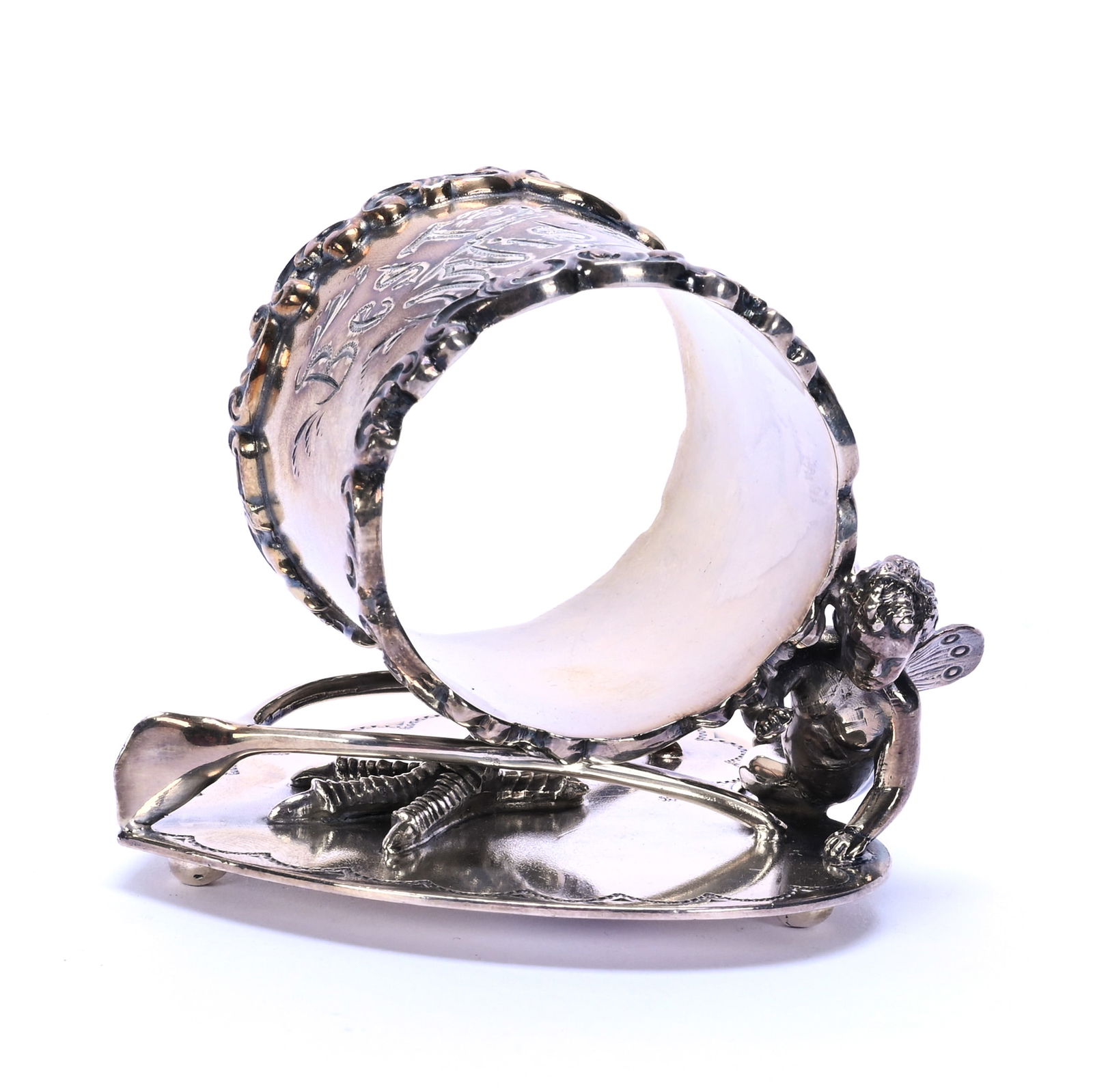 Silverplate Figural Napkin Ring Marked Wilcox #4376: Silverplate Figural Napkin Ring Marked Wilcox #4376, 2.75 x 3.25 x 2.75 Inches, Heart Shape Base Holding Chicken Foot And Cherub, Engraved "Best Wishes", 0.3 Pounds, Dr. Harold & Audrey Eklund
