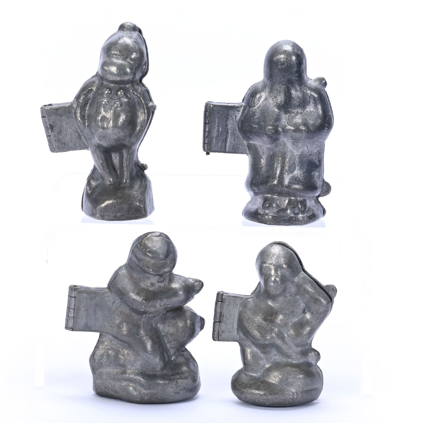(4) Vintage Pewter Ice Cream Molds: (4) Vintage Pewter Ice Cream Molds, Designs Feature Palmer Cox Brownie #1894, Kneeling Soldier #1052, Santa Claus #991, Monkey #362? Longest Is 5", Widest Is 3.75", Deepest Is 2.5", 3.9 Pounds, Dr.