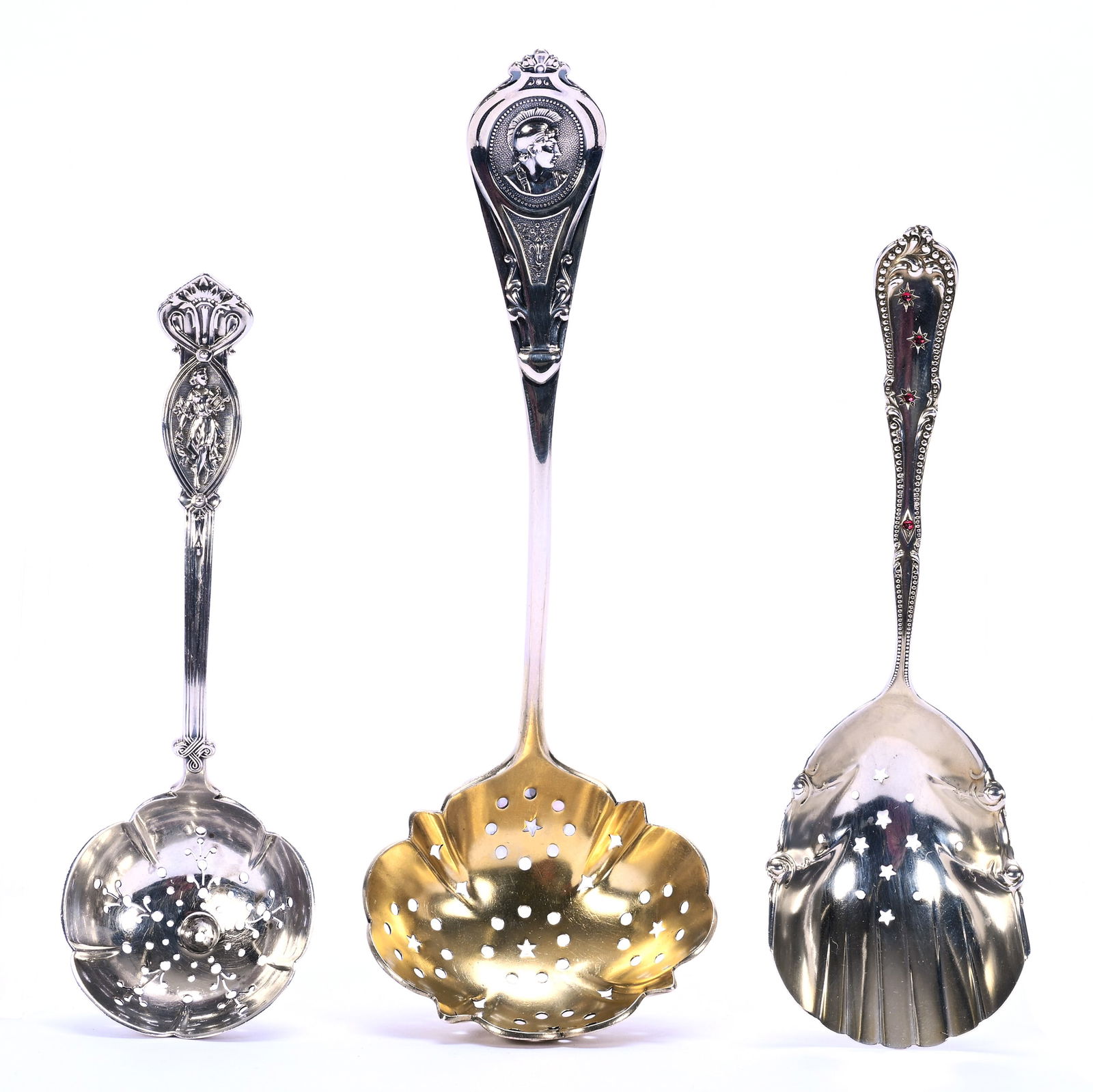 (3) Solid Sterling Or Solid Coin Silver Serving Spoons Including:: (3) Solid Sterling Or Solid Coin Silver Serving Spoons Including: 7.5 x 2.625 x 1.75 Inches, (1) Medallion Handle, Pierced Bowl Marked Albert Cole Coin Silver, (1) 5.75" Sugar Sifter Marked J. E.