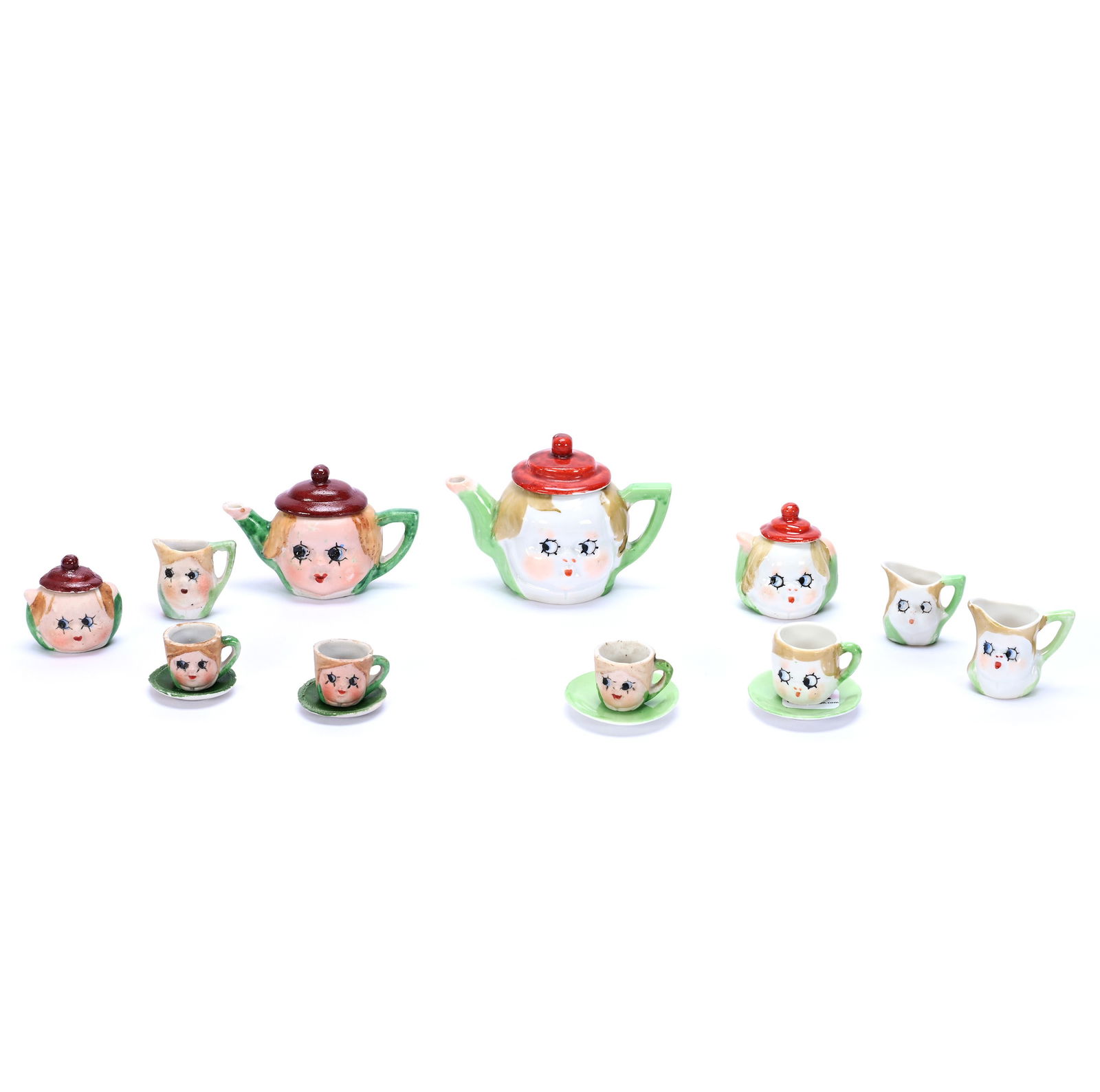 Child's Tea Service, Unmarked Nippon Googly Eye: Child's Tea Service, Unmarked Nippon Googly Eye, 2 x 6.5 x 4.25 Inches, Two Distinct Sets, (1) Set Is Bisque In Original Box Including Teapot, Creamer, Sugar, Three Cups & Two Saucers, (1) Set Is