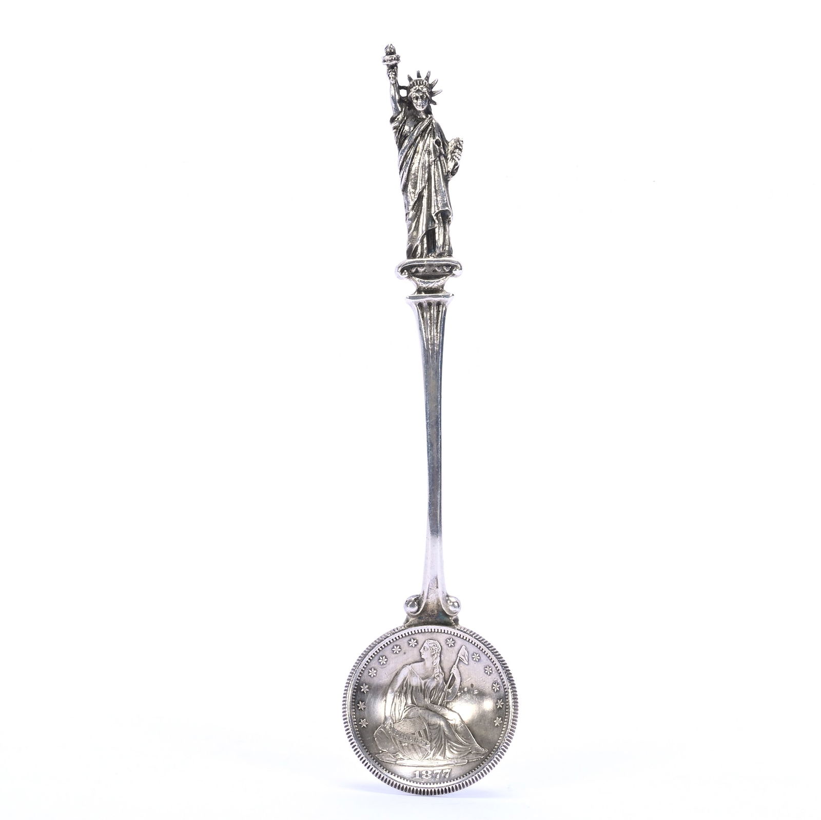 Solid Sterling Silver Spoon, Bowl Is Seated Liberty 1877 Coin, Spoon By Gorham: Solid Sterling Silver Spoon, Bowl Is Seated Liberty 1877 Coin, Spoon By Gorham, 5 x 1.125 x 0.5 Inches, Statue Of Liberty Handle, 25.0 Grams, Dr. Harold & Audrey Eklund Estate, Iowa.