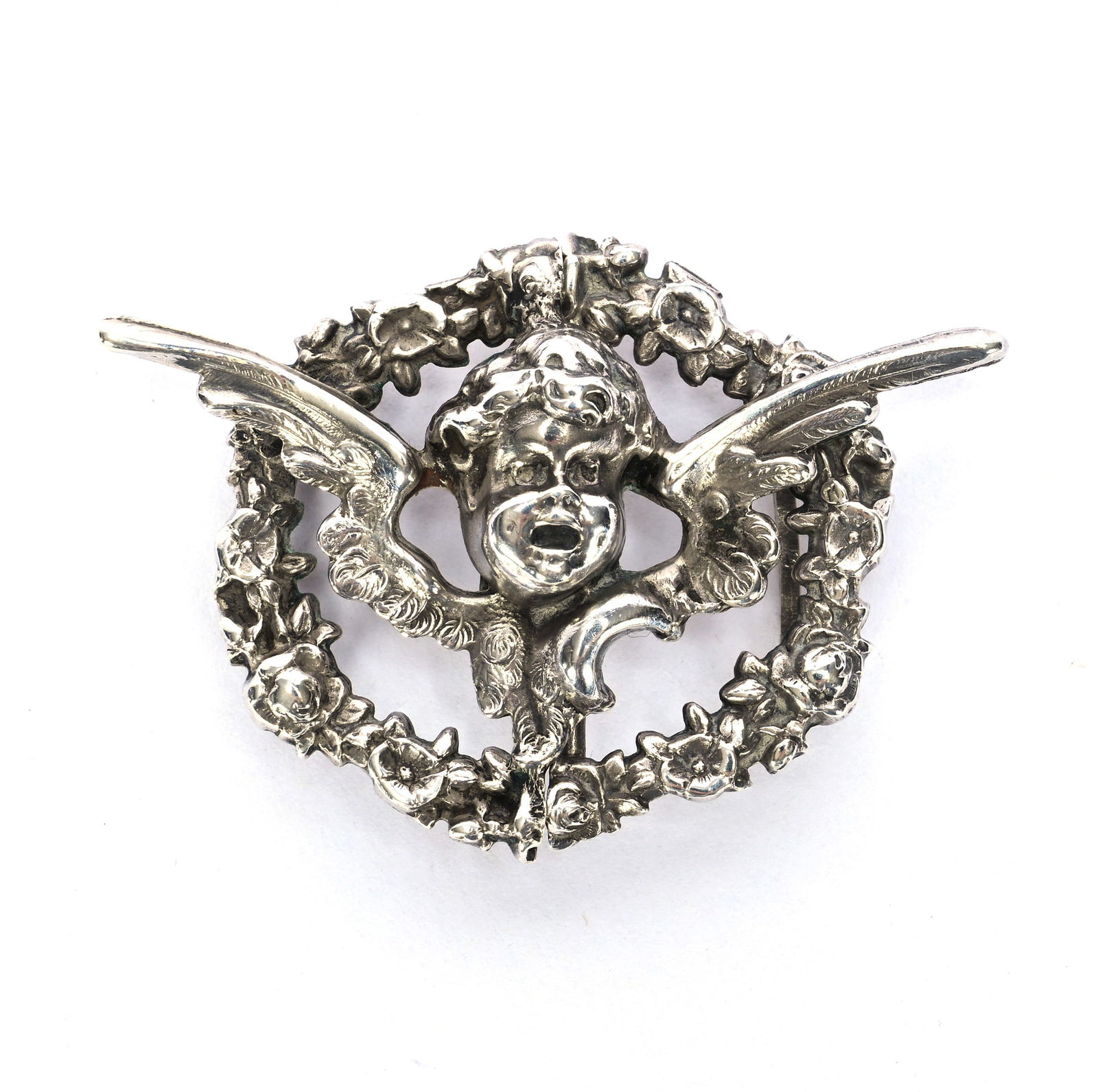 Solid Sterling Silver Belt Buckle Set Marked Kerr & Company #11: Solid Sterling Silver Belt Buckle Set Marked Kerr & Company #11, 1.75 x 1.25 x 0.5 Inches, Single Wreath And Winged Cherub Design, 7.0 Grams, Dr. Harold & Audrey Eklund Estate, Iowa.