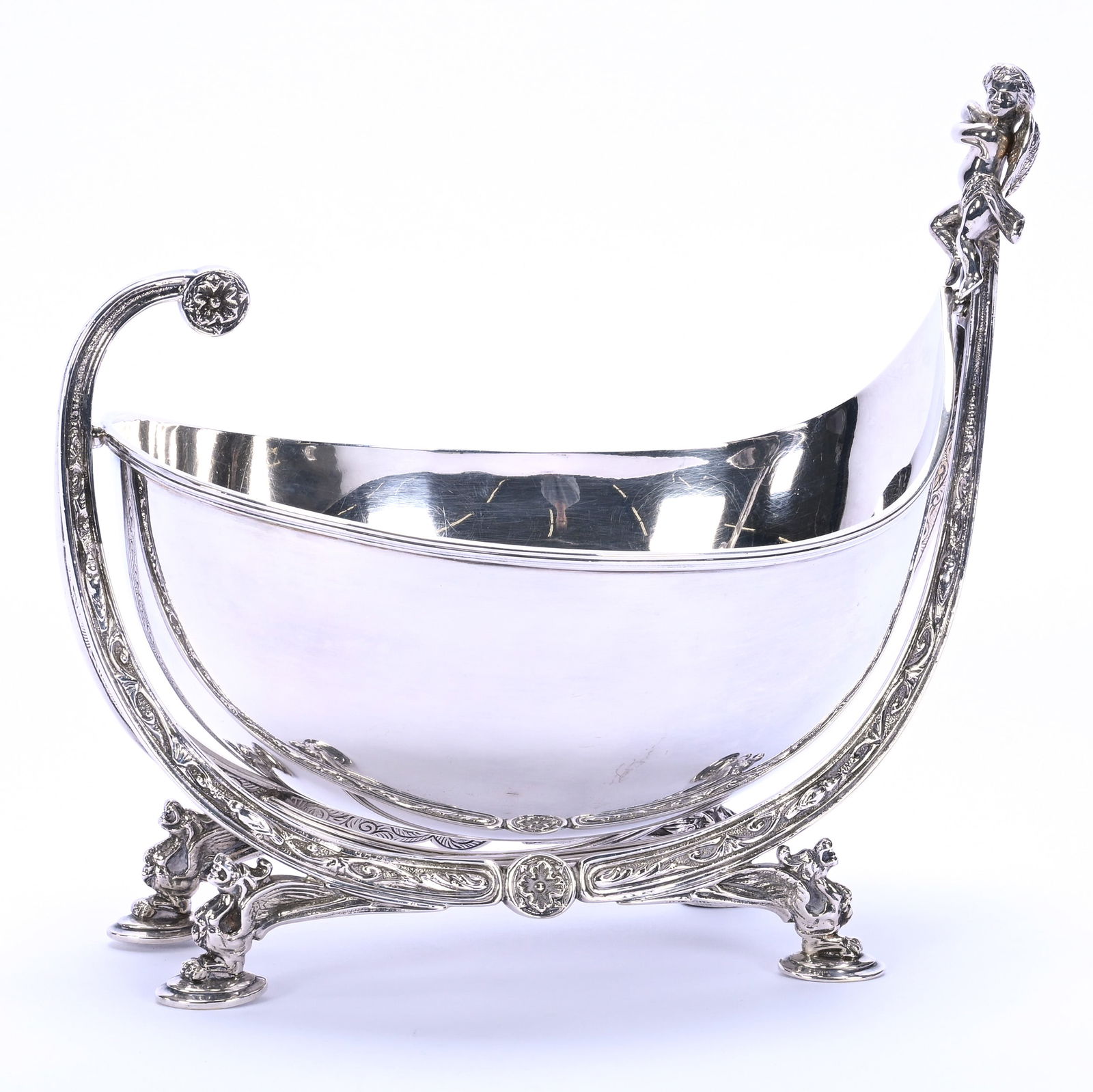Victorian Silverplate Nut Bowl, Frame Features Cherub & Griffins: Victorian Silverplate Nut Bowl, Frame Features Cherub & Griffins, 8.25 x 9 x 6.5 Inches, Nut Bowl Swings In Frame, No Visible Maker's Marks, 1.5 Pounds, Dr. Harold & Audrey Eklund Estate, Iowa.
