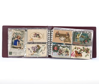 Over (100) Early Christmas Postcards In Album