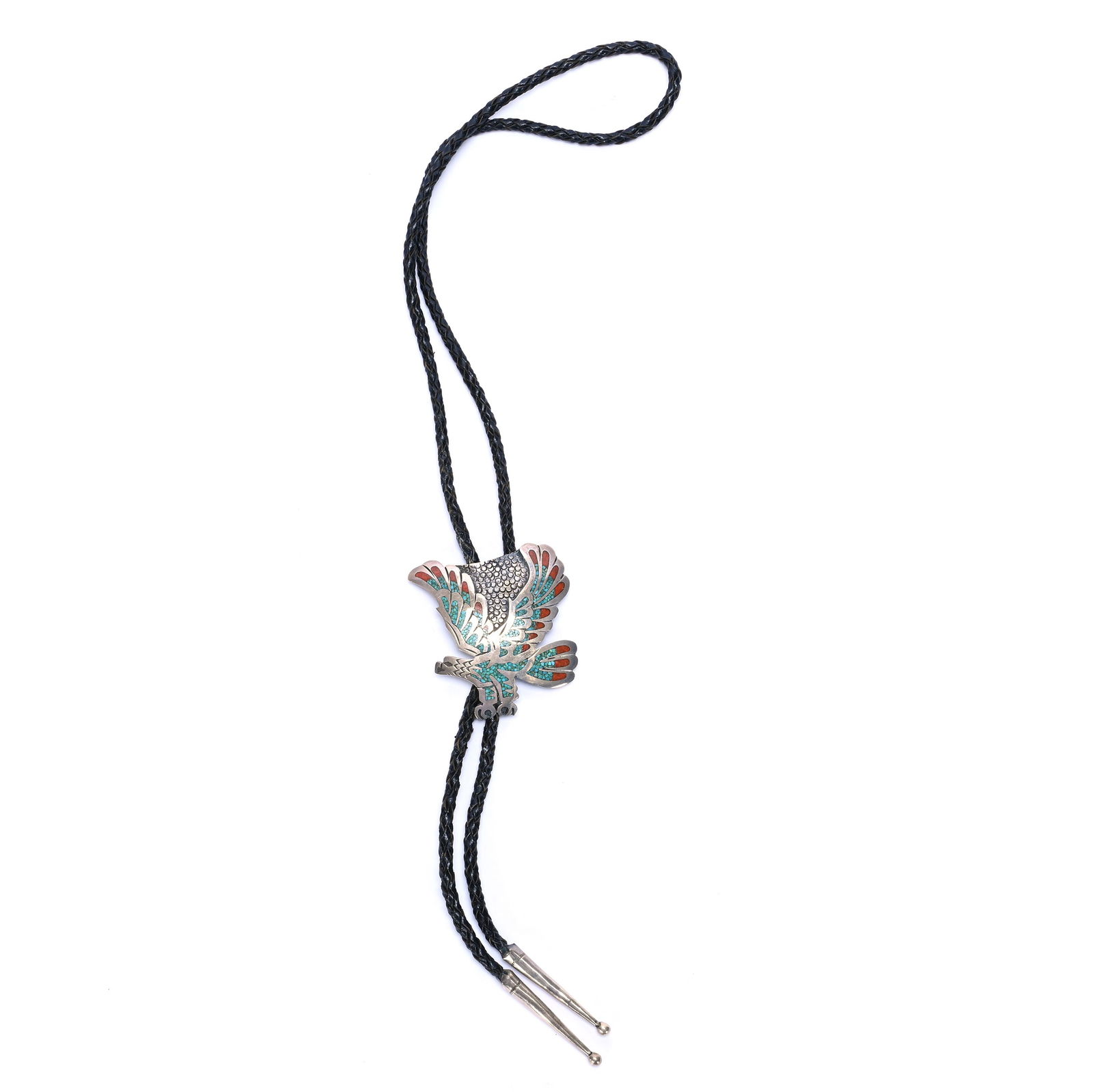Bolo Tie, Navajo Silver Eagle With Turquoise & Coral Highlights: Bolo Tie, Navajo Silver Eagle With Turquoise & Coral Highlights, 18 x 2.25 x 0.5 Inches, Attributed Tommy Singer, Marked "Bennett Patent Pending", 43.0 Grams, Dr. Harold & Audrey Eklund Estate, Iowa.