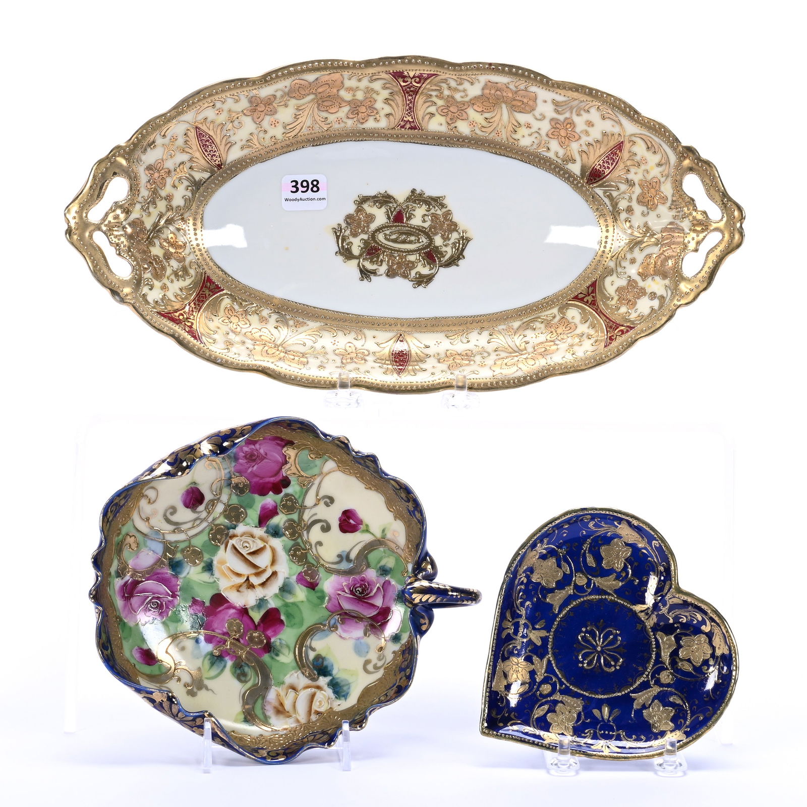 (3) Items Marked Nippon: (3) Items Marked Nippon Including(1) 2" x 13" x 6.5" Celery Tray, White, Yellow & Red With Heavy Gold, (1) 2.5" x 7.5" x 6.5" Handled Nappy, Yellow & Green With Cobalt Blue Border, Pink Rose Decor,