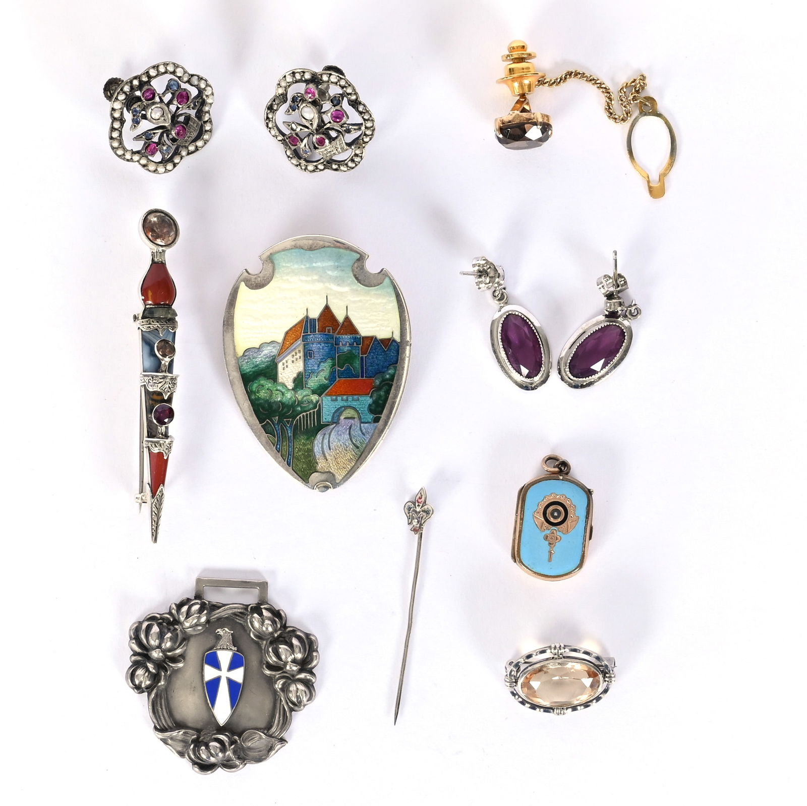(10) Jewelry Items Including: (10) Jewelry Items Including (1) 1.5" x 1.5" Sterling Watch Fob Inscribed "1904 Junior Hop", (1) 2" x 1.5" Broach, Sterling Shield Shape, Enamel Castle Scene, (1) 1.25" x 0.25" Silver Pin In Form Of