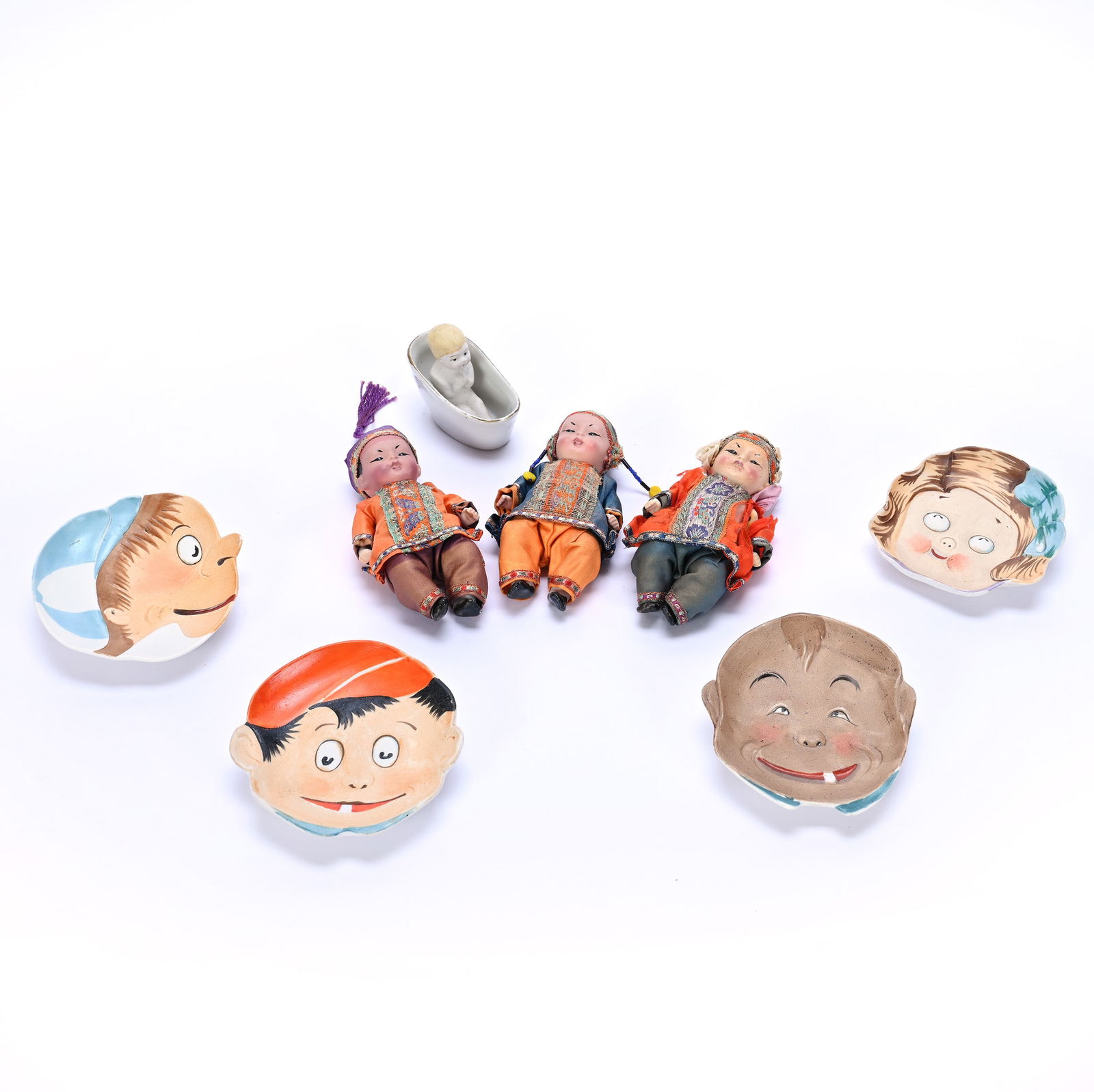 (8) Bisque Items Marked Nippon: (8) Bisque Items Marked Nippon Including (3) 5.5" x 2.75" x 1.75" Oriental Dolls In Original Cases "A Baby From The Orient", (4) 4" Googly Eye Character Head Trays, (1) 1.5" x 3" Baby In Bath Tub,