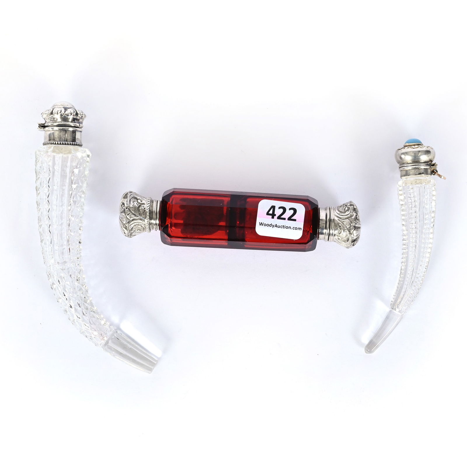 (3) Laydown Perfumes: (3) Laydown Perfumes, 5.5 x 1 x 1 Inches, Including(1) Tusk Shape With Silver Flip Top, (1) Tusk Shape, Prism Body, Silver Flip Top With Turquoise Gem, Original Glass Stopper, (1) Solid Red Double Per
