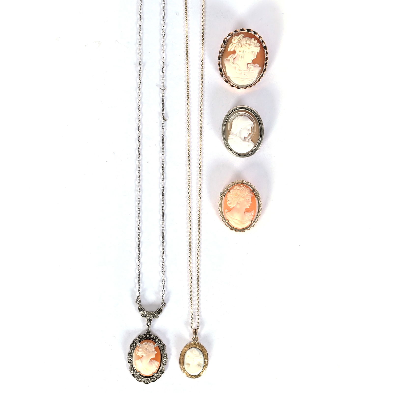 (5) Victorian Era Carved Cameo Broaches And Necklaces: (5) Victorian Era Carved Cameo Broaches And Necklaces, 1.25 x 1 x 0.25 Inches, Group Includes Some Sterling, Some Goldplate, Nice Carved Designs, See Photos For Details, 27.0 Grams, Dr. Harold &