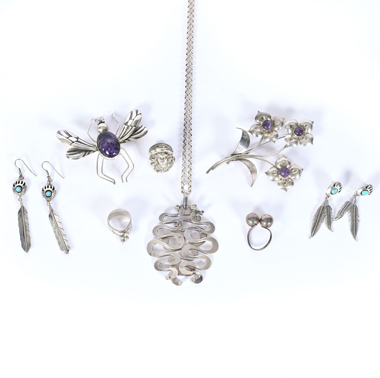 (8) Solid Sterling Silver Jewelry Items: (8) Solid Sterling Silver Jewelry Items, 4.25 x 3 x 0.5 Inches, Items Include (1) Norwegian Necklace, Signed, (1) Broach In Form Of Floral Bouquet, (3) Rings, (2) Pair Of Earrings With Native