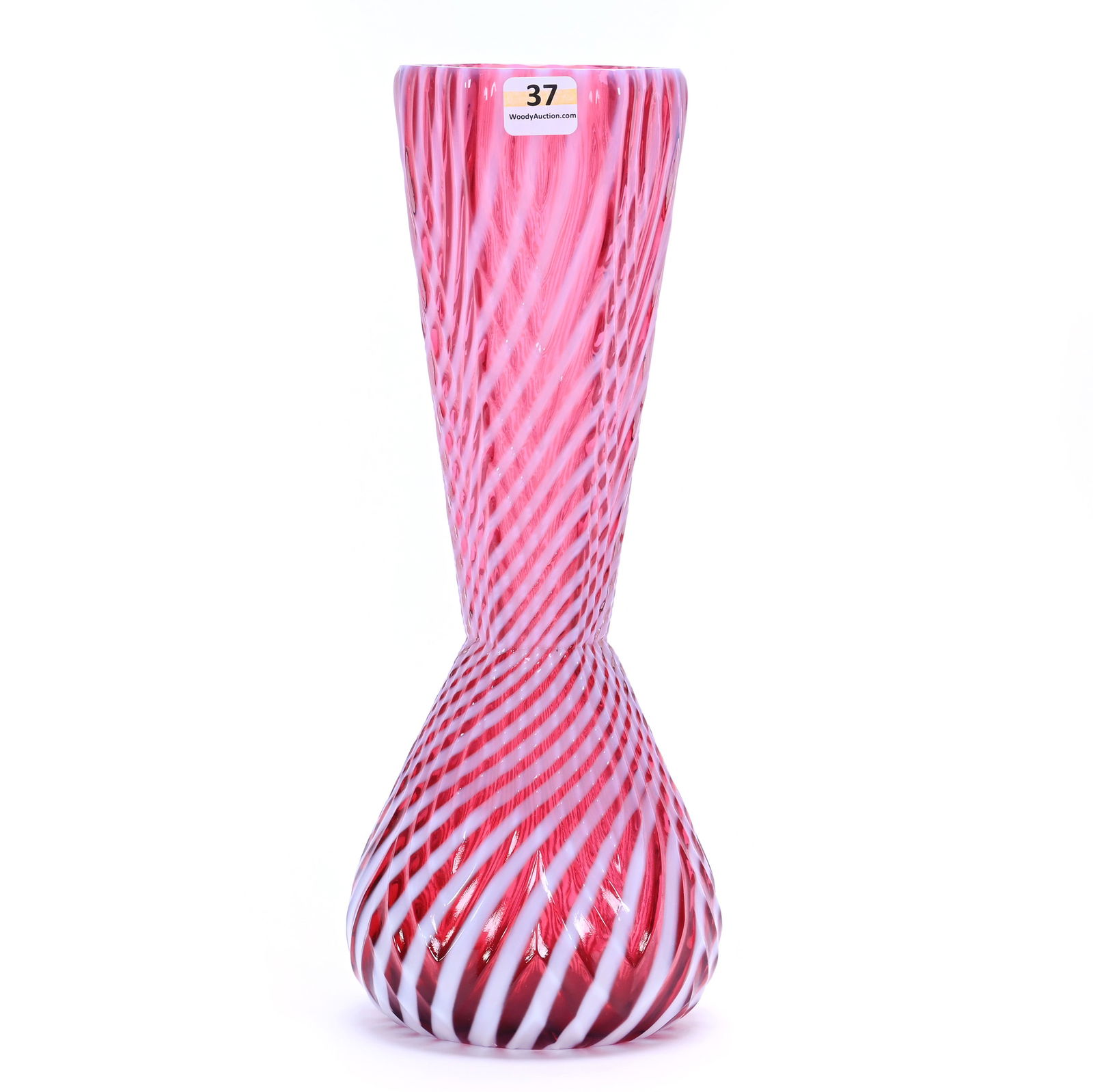 Vase, Attributed To Hobbs Brockunier: Vase, Attributed To Hobbs Brockunier, 12 x 4.75 x 4.75 Inches, Cranberry Opalescent Swirl, Nice Embossed Design, Six-Sided Top, 2 Pounds, Charles And Nikia Schulte, Missouri.