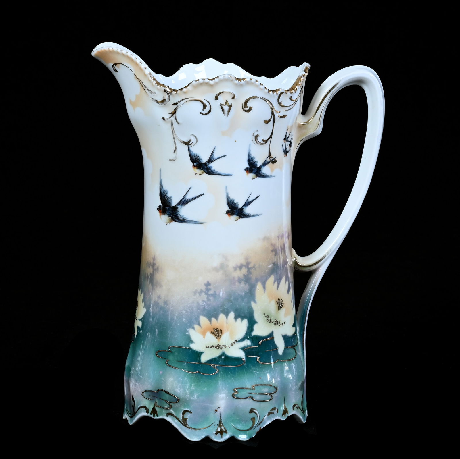 Tankard, Marked R.S. Prussia: Tankard, Marked R.S. Prussia, 9.75 x 7.5 x 4.75 Inches, Green, Orange, And White Luster Finish With Bluebird And Water Lily Decor, 1.8 Pounds, Grady And Annette Hite Collection.