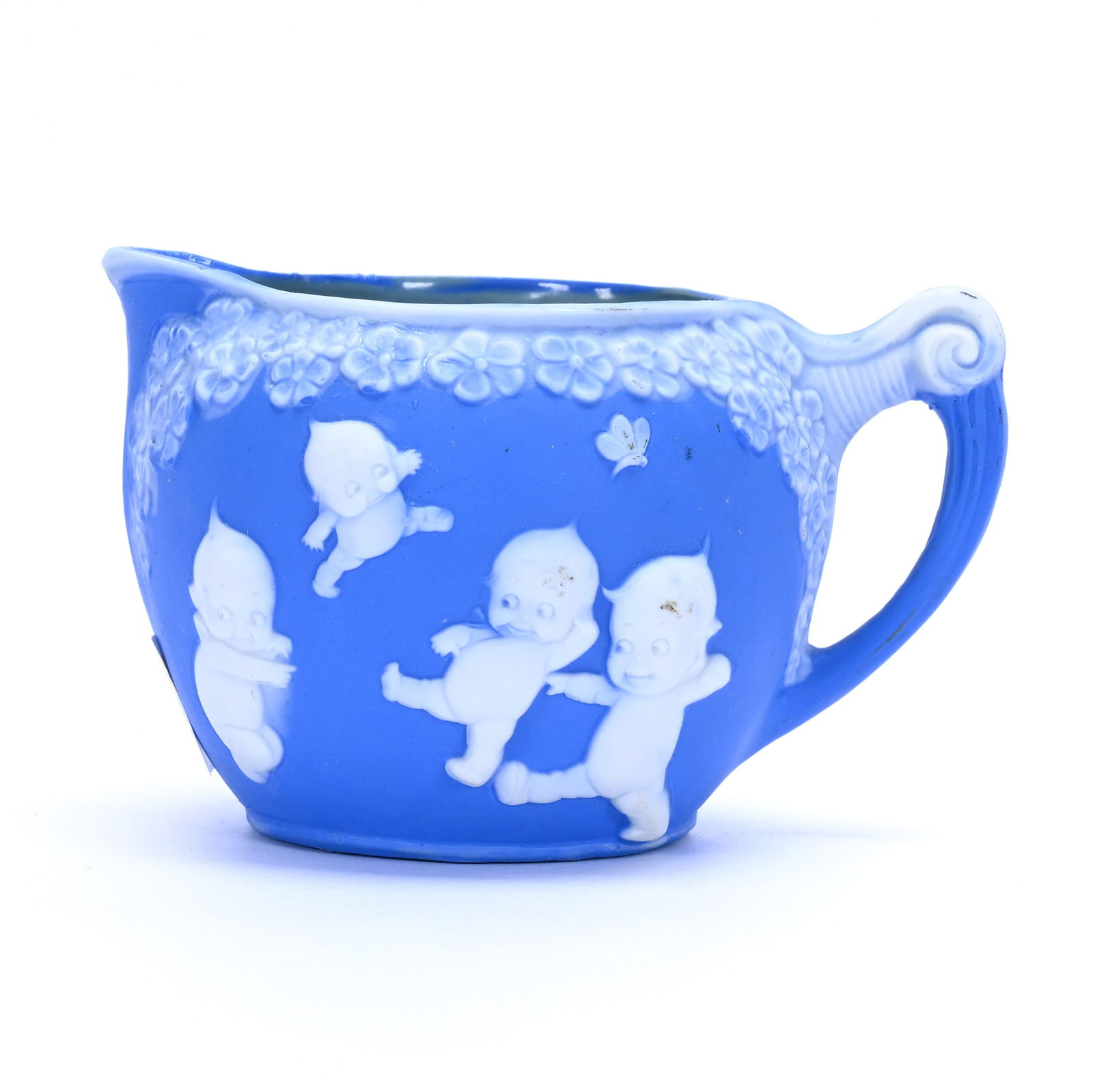 Creamer, Marked Rose O'Neill Kewpie Germany: Creamer, Marked Rose O'Neill Kewpie Germany, 2.75 x 4 x 3.25 Inches, Blue And White Jasperware, 0.3 Pounds, Grady And Annette Hite Collection.