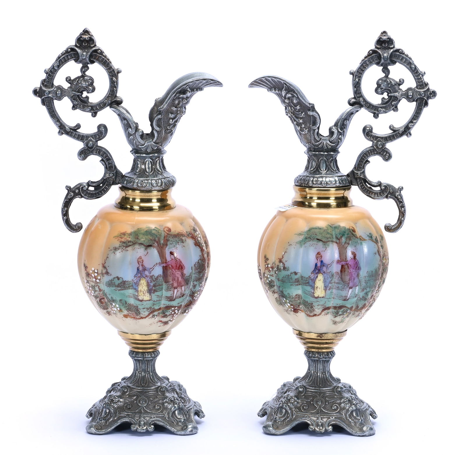 Pair Of Pedestal Decorative Ewers: Pair Of Pedestal Decorative Ewers, 15.5 x 6 x 5 Inches, Unmarked Melon Ribbed Opalware Body With Courting Scenes, White Metal Handle And Foot, 6.2 Pounds, Grady And Annette Hite Collection.