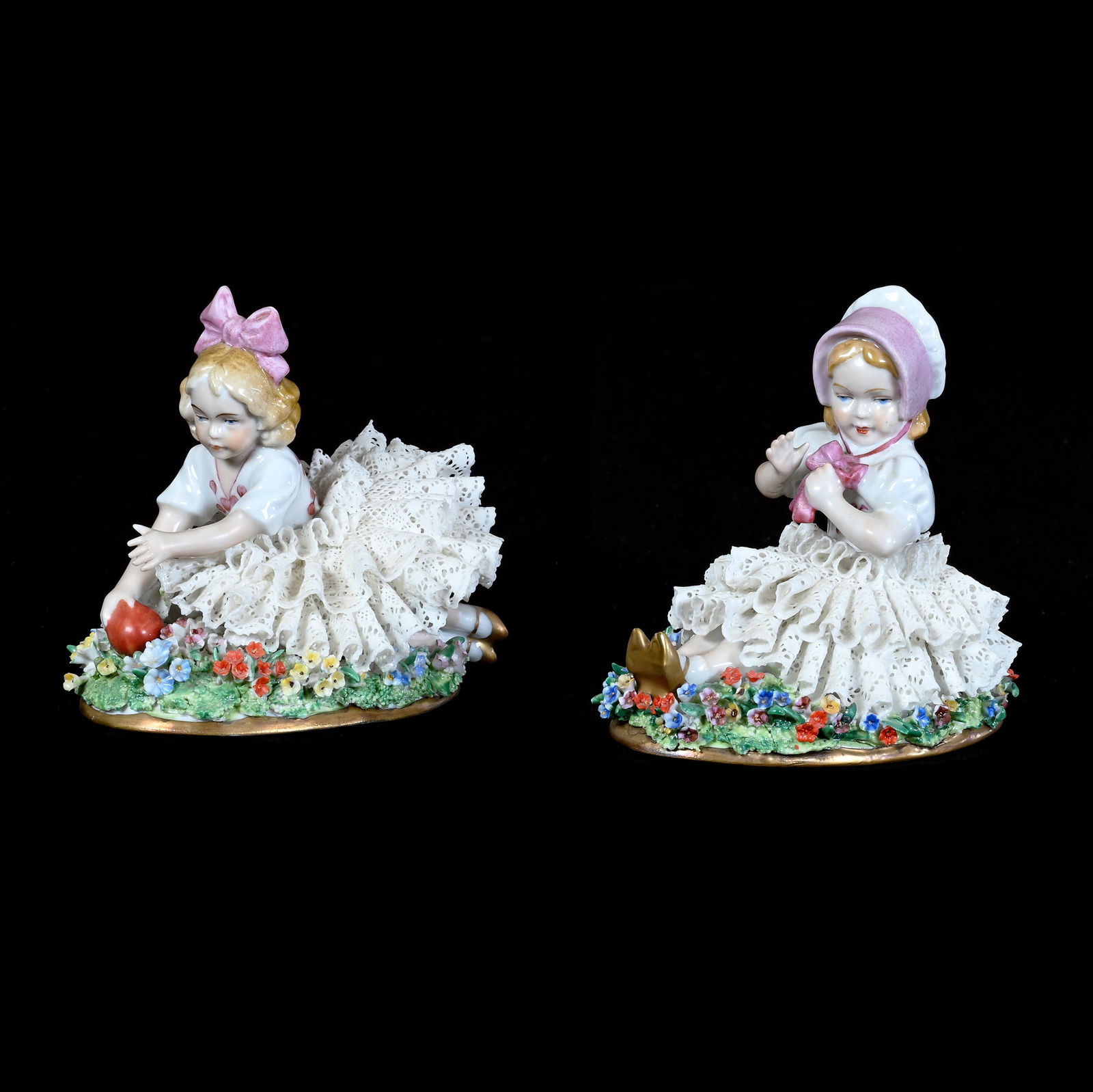 (2) Figurines Marked Sitzendorf Porcelain: (2) Figurines Marked Sitzendorf Porcelain, 3.75 x 3.75 x 3.25 Inches, Young Girls In Lace Dresses, Some Chips To Lace, 0.9 Pounds, Grady And Annette Hite Collection.